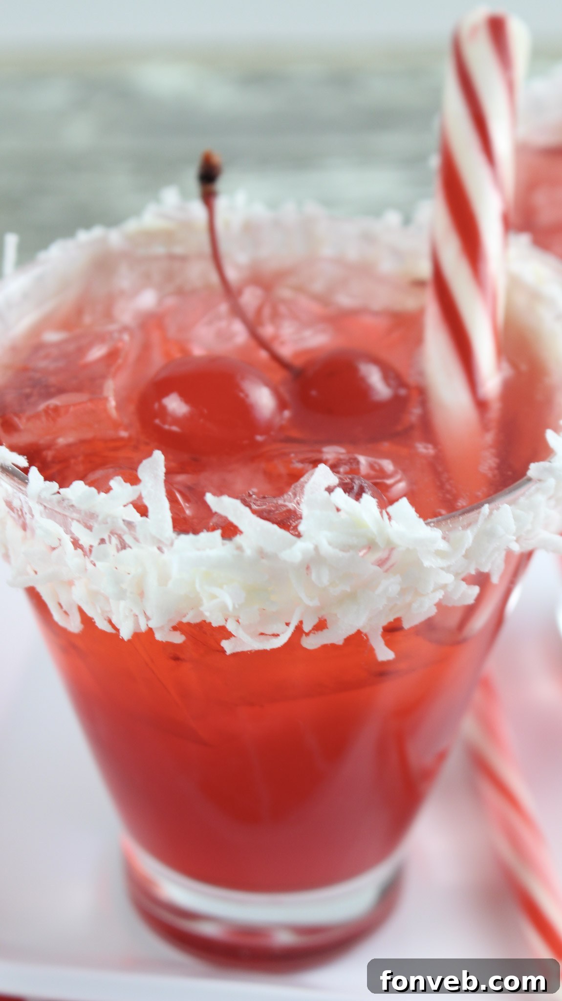 A final close-up of a Santa Hat Cocktail, showcasing its vibrant color and unique rim, inviting a sip.
