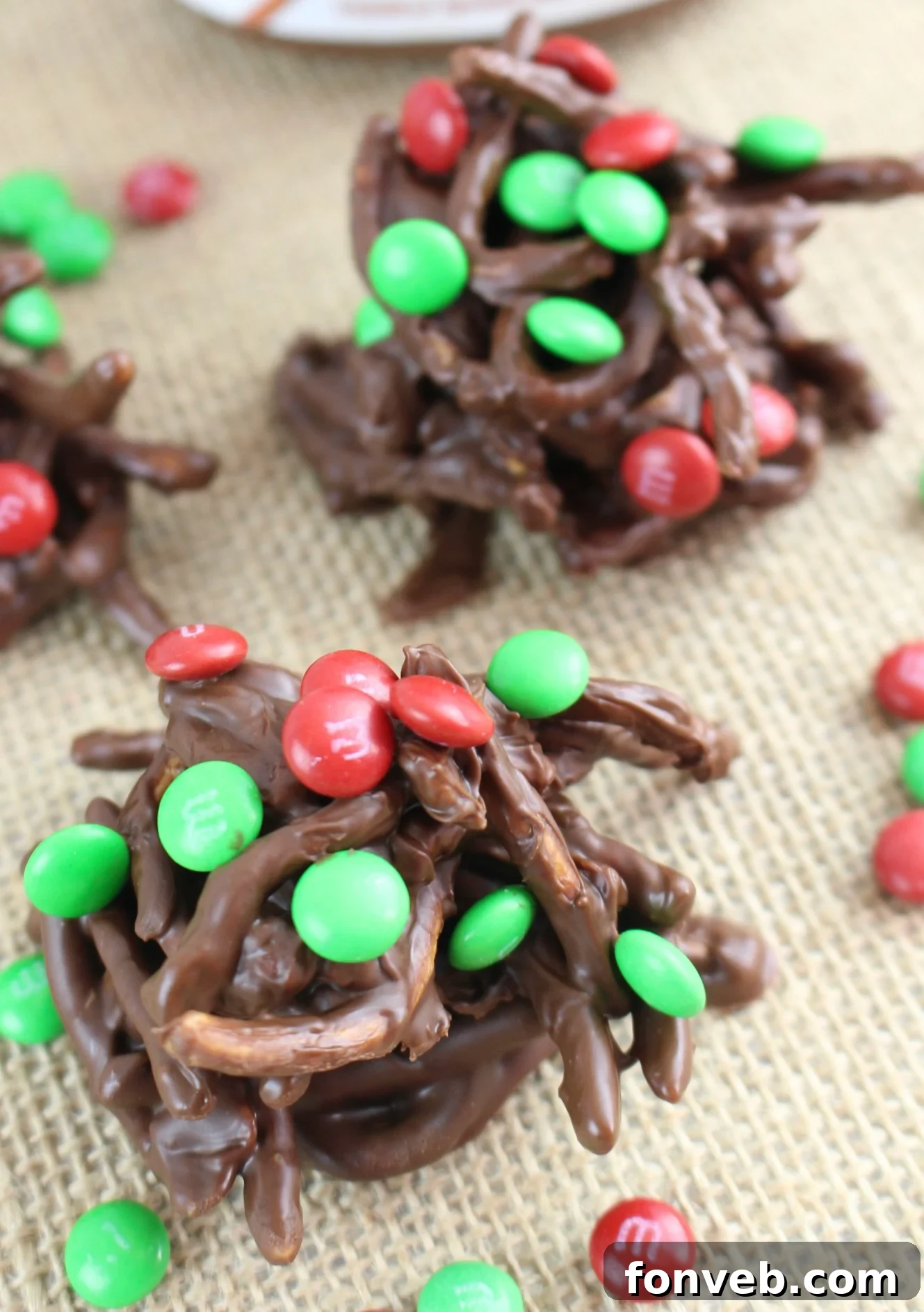 A festive pile of chocolate haystacks with red and green M&Ms