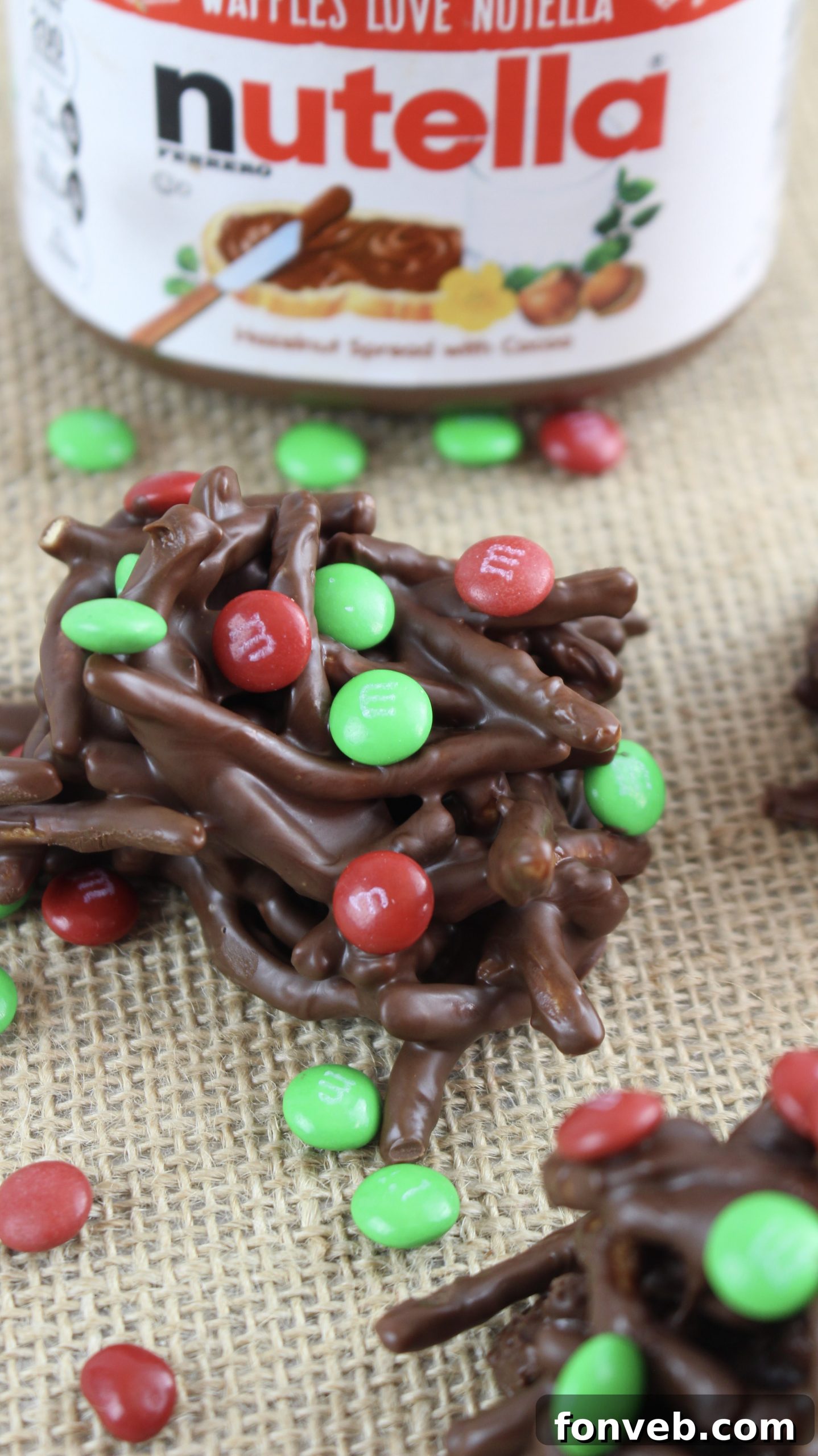 Stacked chocolate haystacks on a white plate