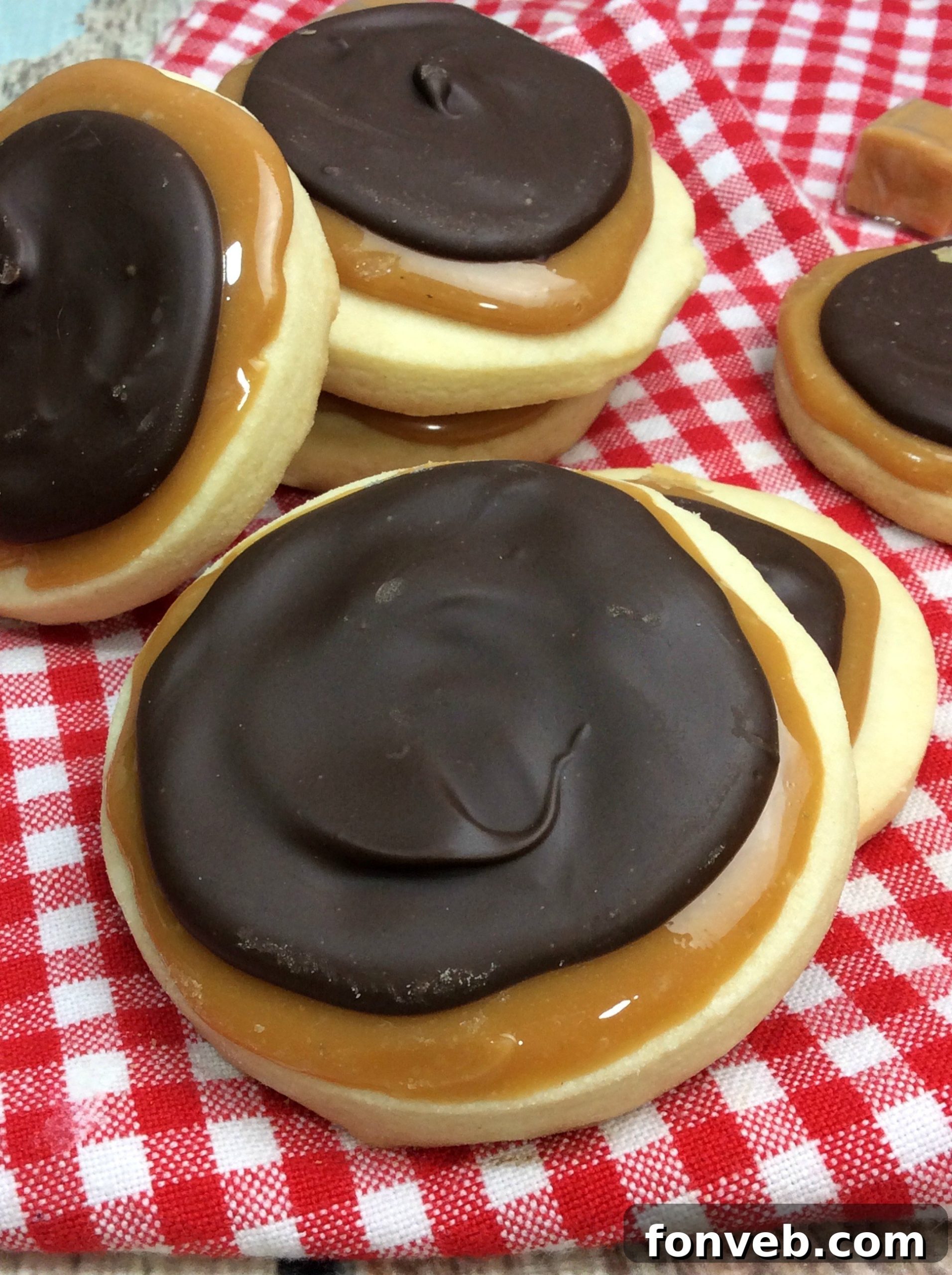 Delicious homemade Twix cookies with a shortbread base, caramel, and chocolate