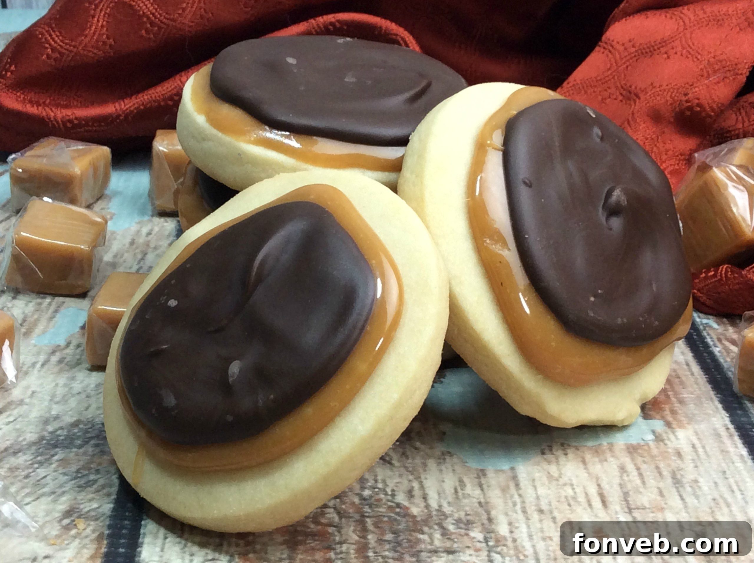 Homemade Twix cookies stacked and presented beautifully, highlighting their appeal