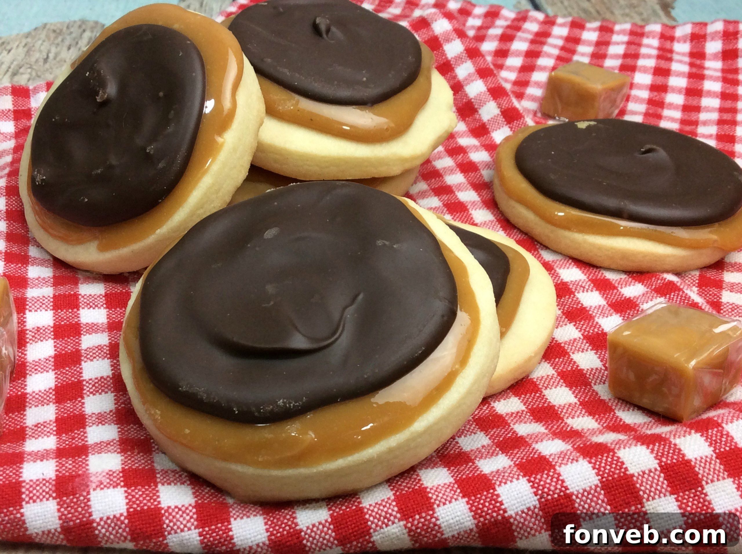 Variety of homemade chocolate caramel shortbread cookies arranged for a delicious display