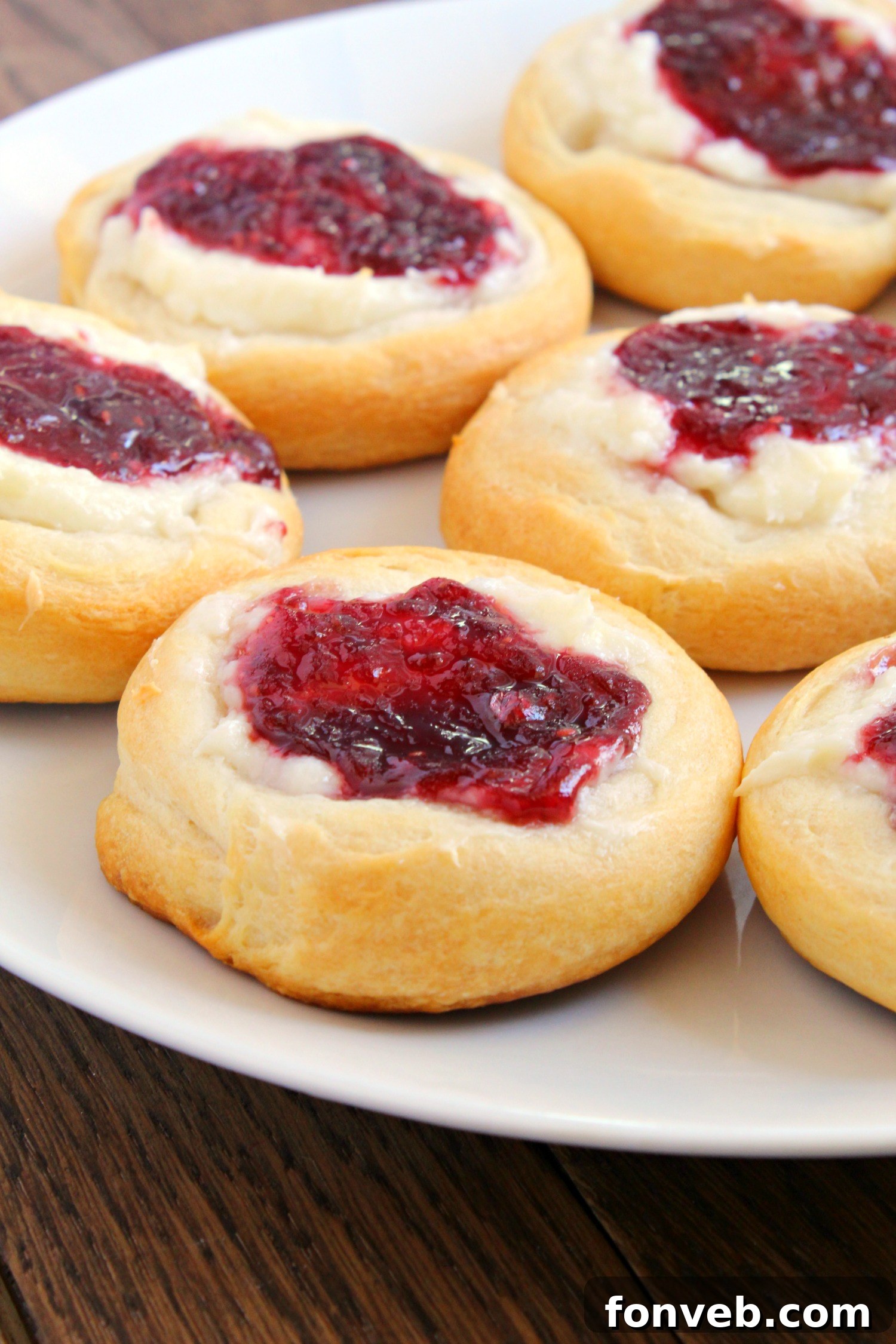 Close-up of crescent roll dough being prepared for danishes.