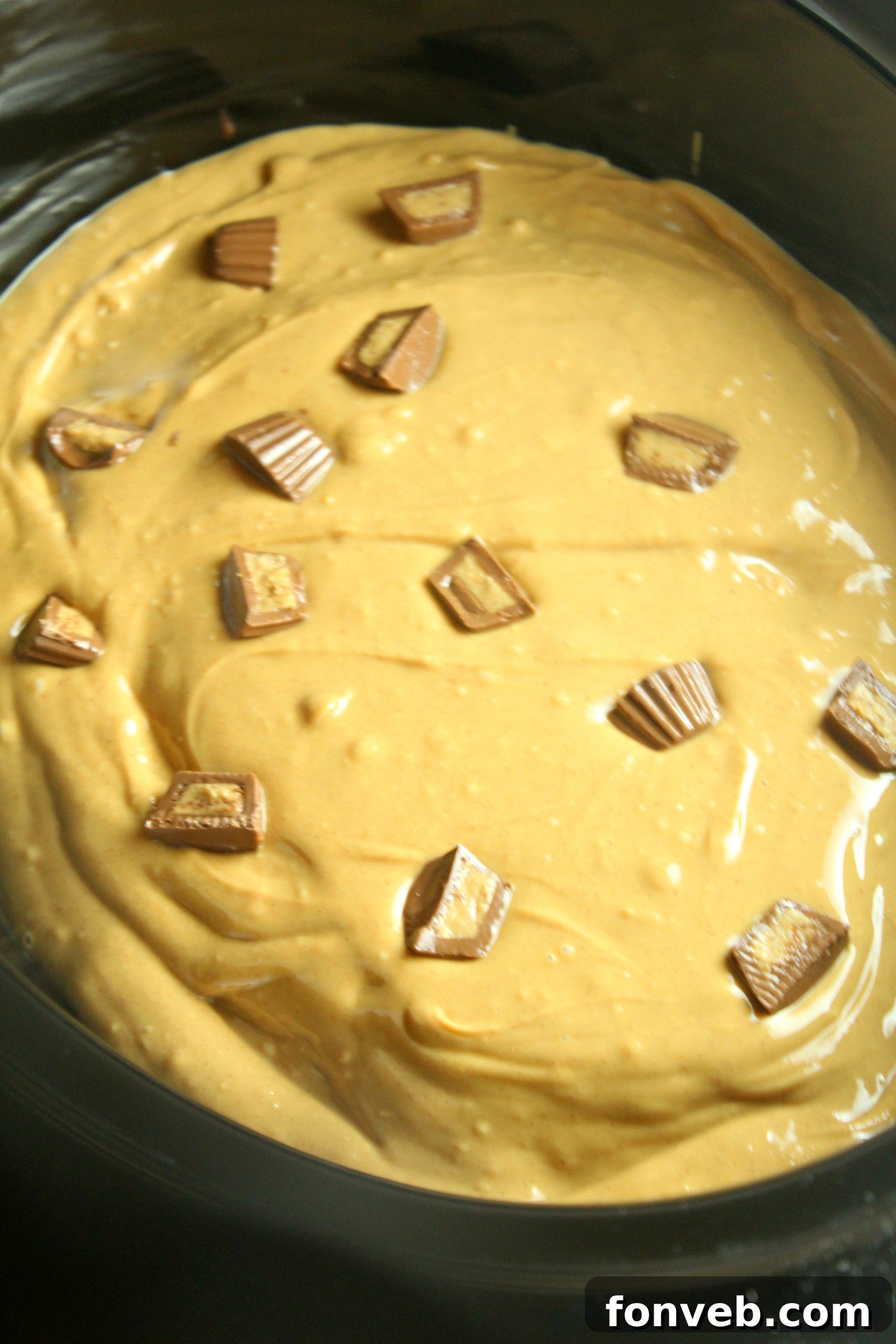 Slow Cooker Reeses Peanut Butter Chocolate Fudge Cake 3 Close-up of a slow cooker Reese's peanut butter chocolate cake showing the moist interior