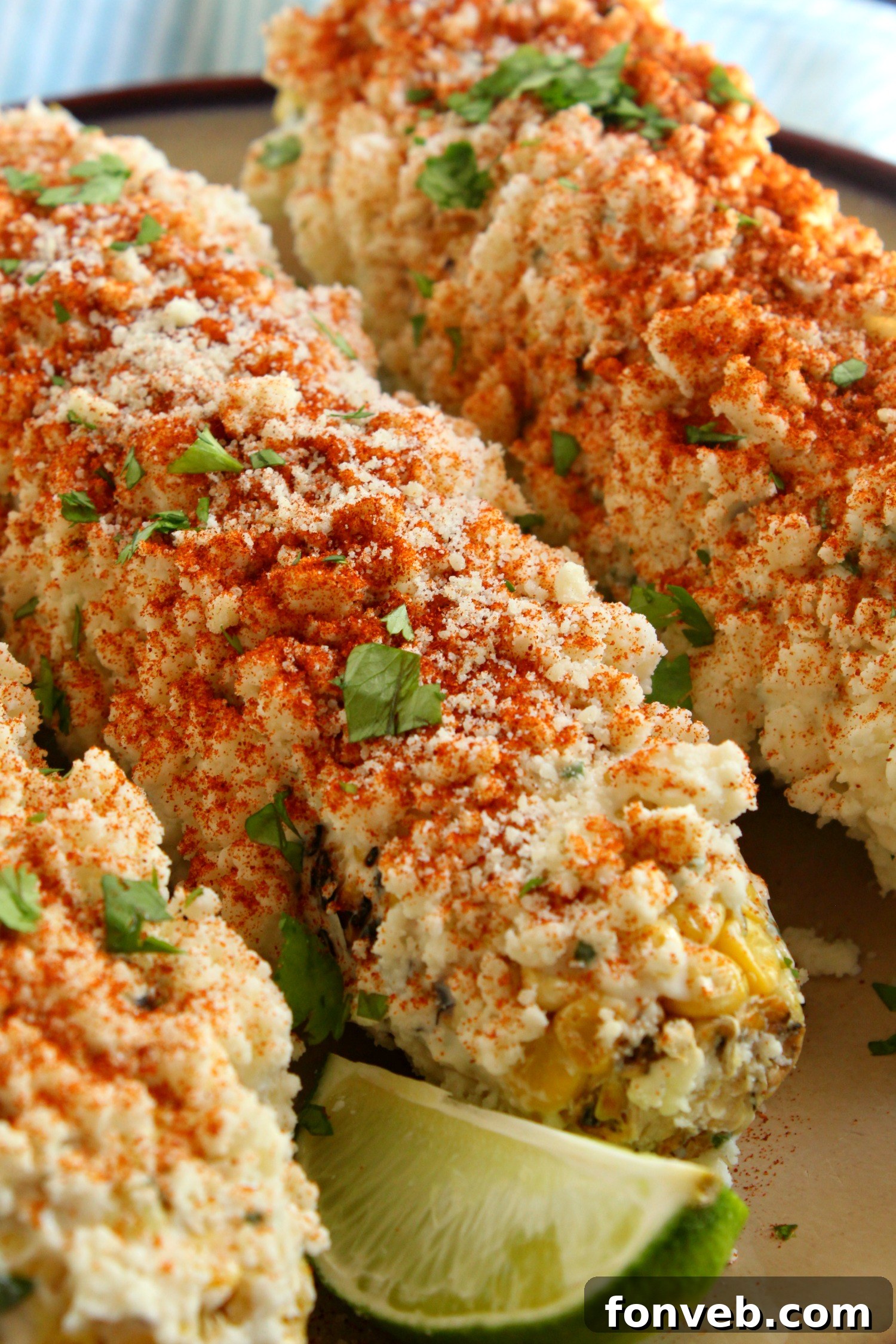 Close-up of crumbled Cotija cheese, ready to be added to Mexican Street Corn.