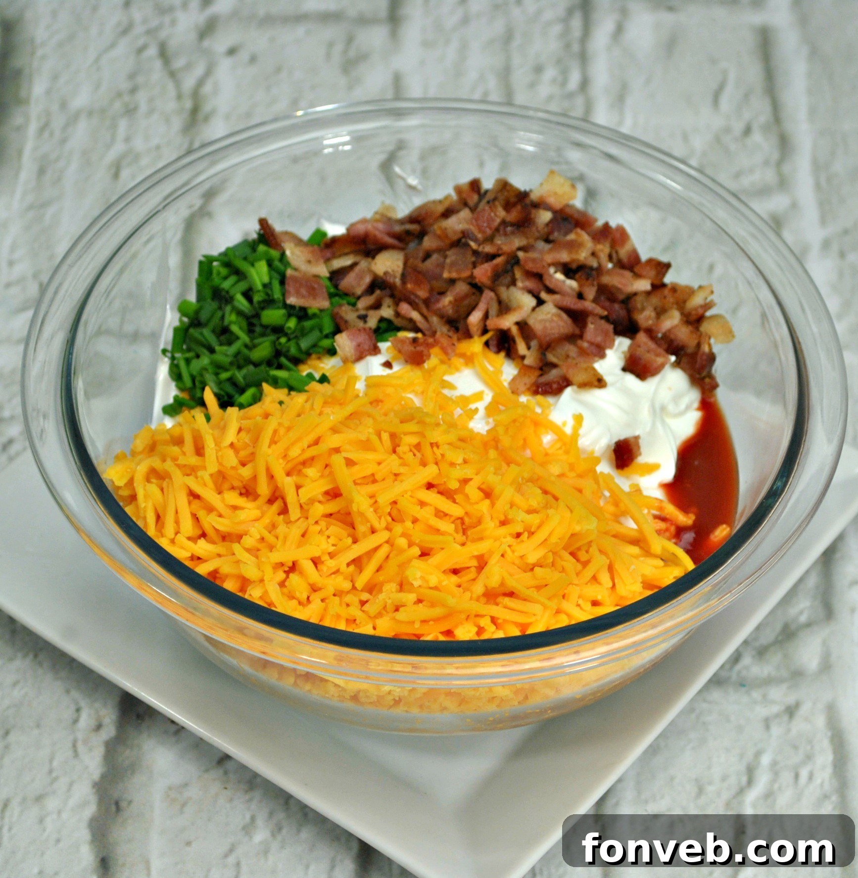 Serving of Million Dollar Bacon Dip with crackers