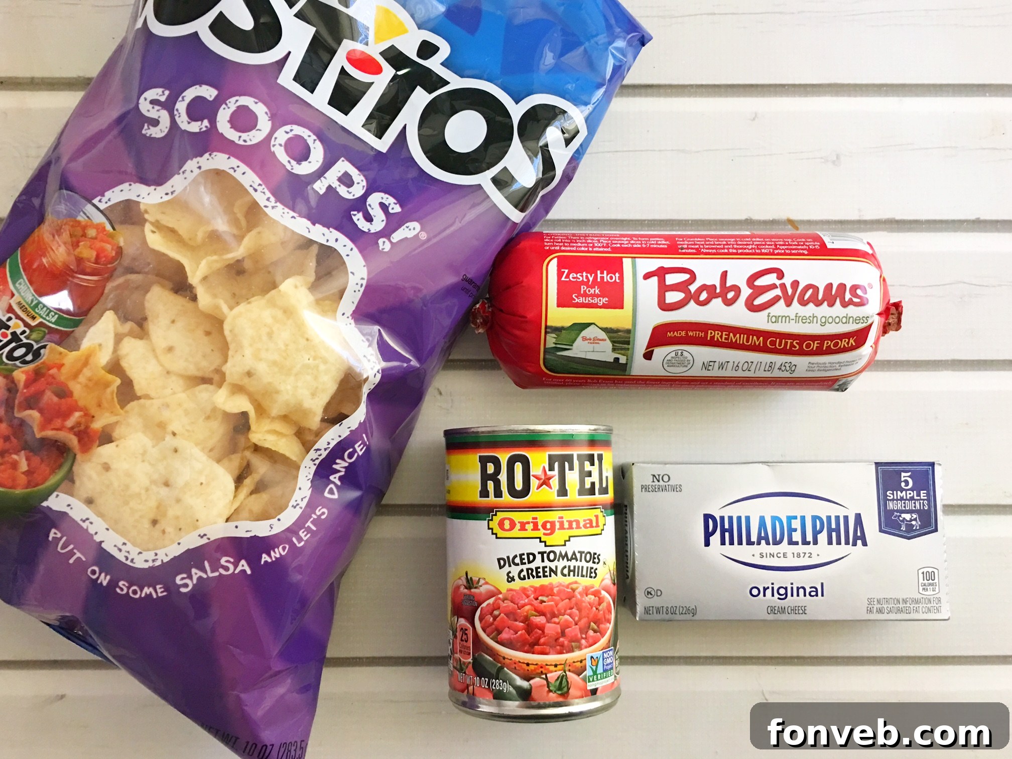 Mouthwatering Three-Ingredient Spicy Sausage Dip 3 A top-down view of the prepared spicy sausage dip in a white bowl, ready to be enjoyed.