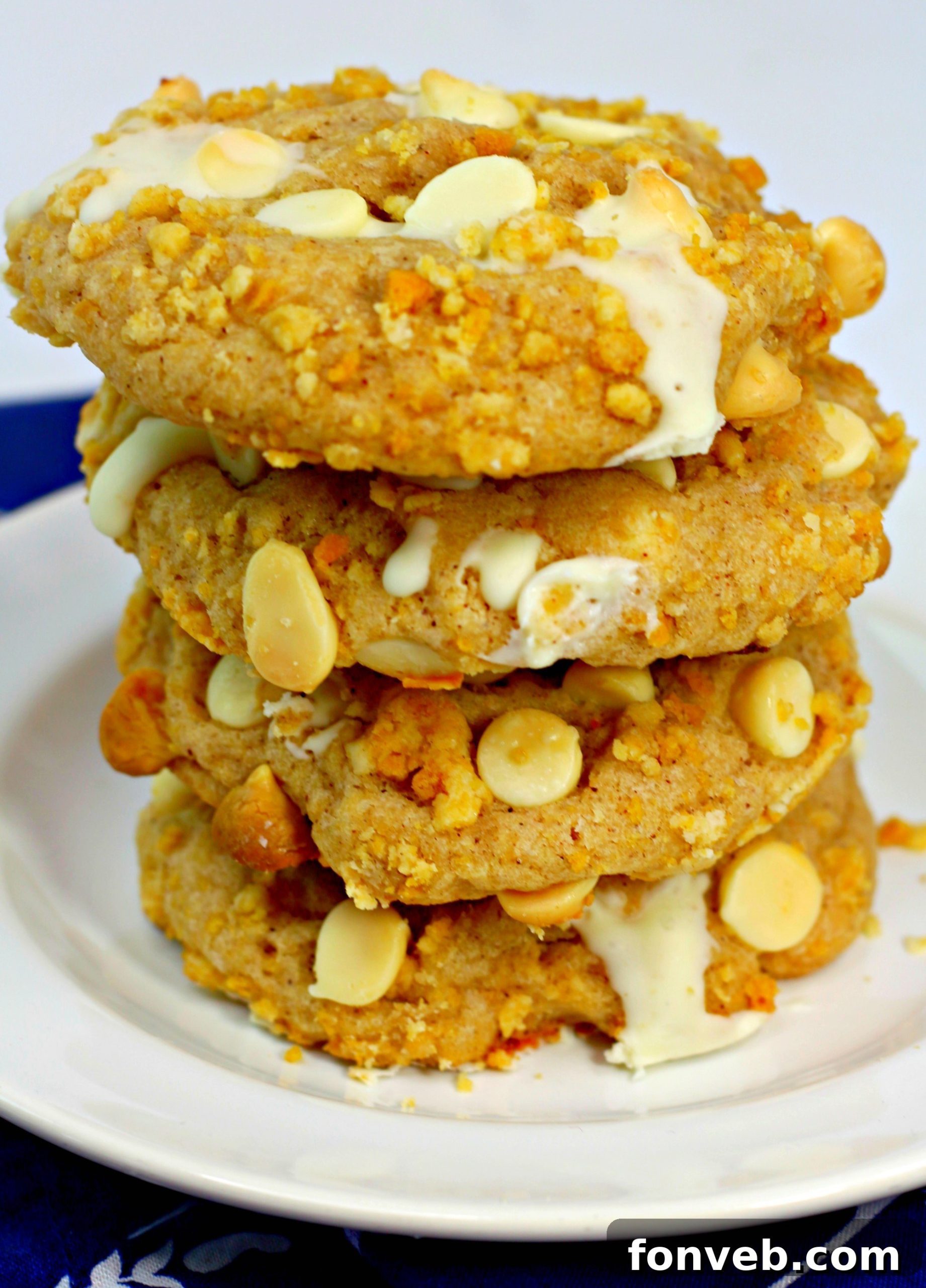 Decadent Cinnamon Roll Stuffed Cookies 6 Overhead view of several cinnamon roll stuffed cookies on a plate, ready to eat.