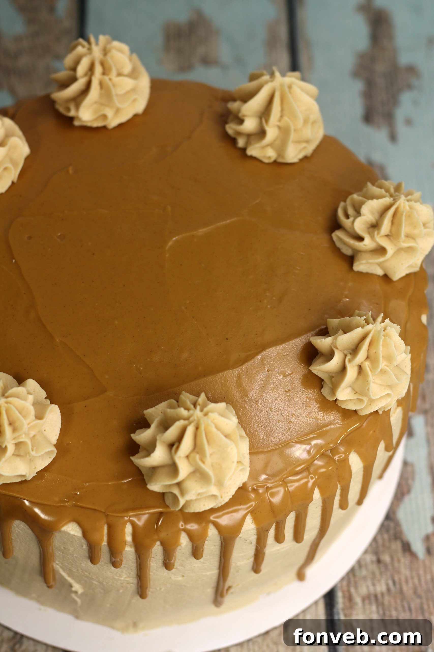 The Irresistible Peanut Butter Cake Experience 7 A vibrant slice of peanut butter cake, showcasing the moist interior, thick frosting, and the appealing contrast of colors and textures.