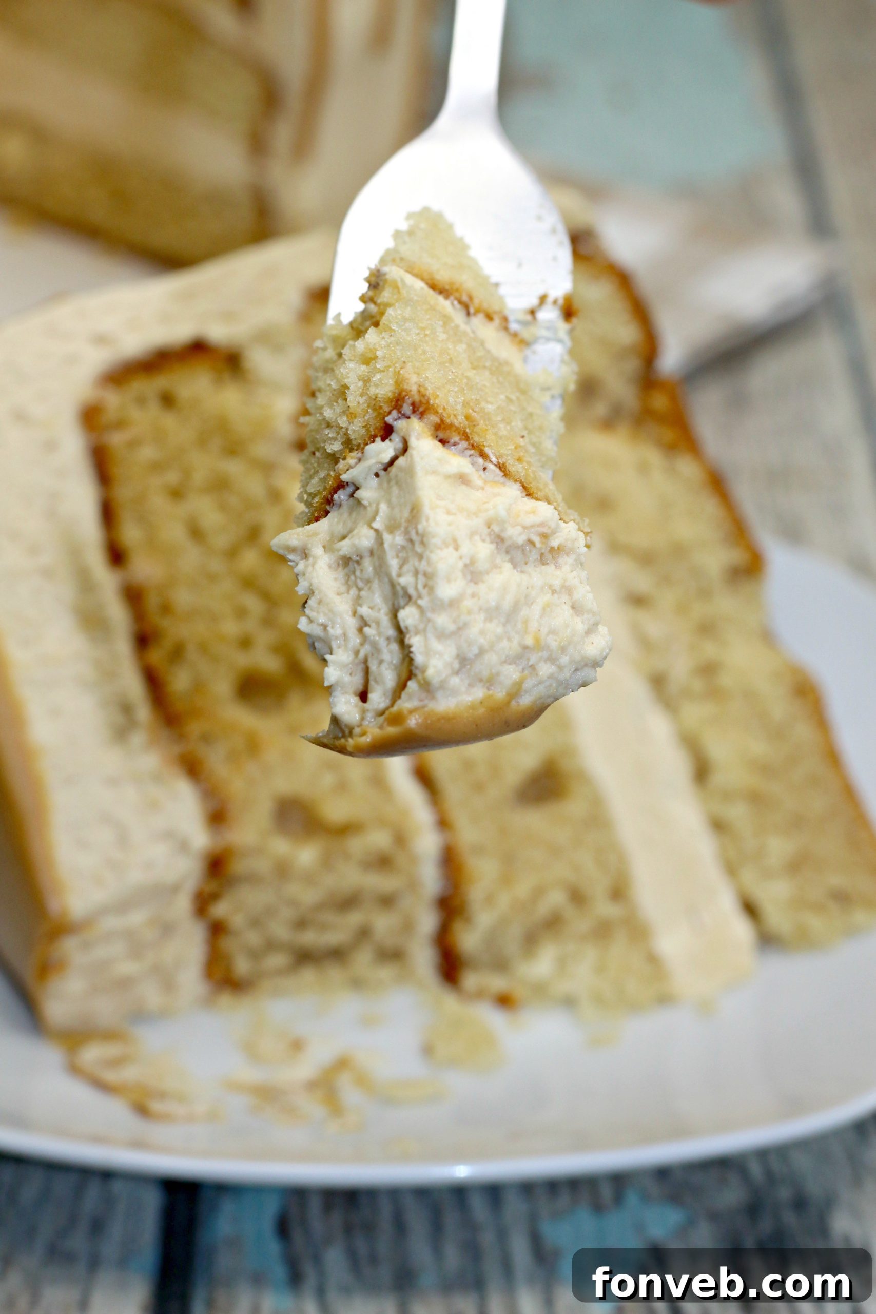 The Irresistible Peanut Butter Cake Experience 10 A final close-up shot of the peanut butter layered cake, perfectly sliced and ready to be enjoyed, emphasizing its rich texture and inviting appearance.
