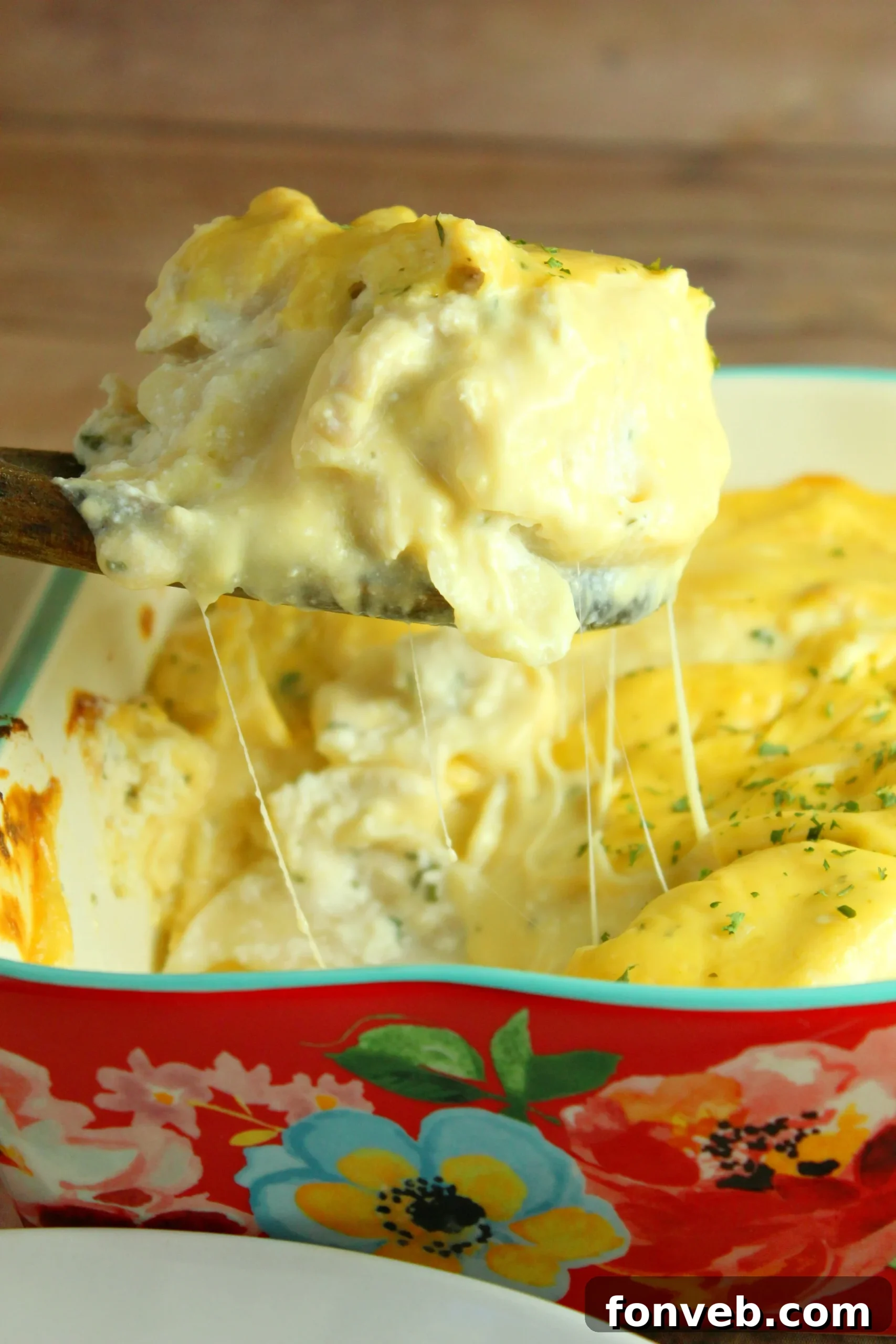 Creamy Garlic Chicken Stuffed Pasta Bake 4 Jumbo pasta shells filled with a rich chicken and cheese mixture, ready for baking.