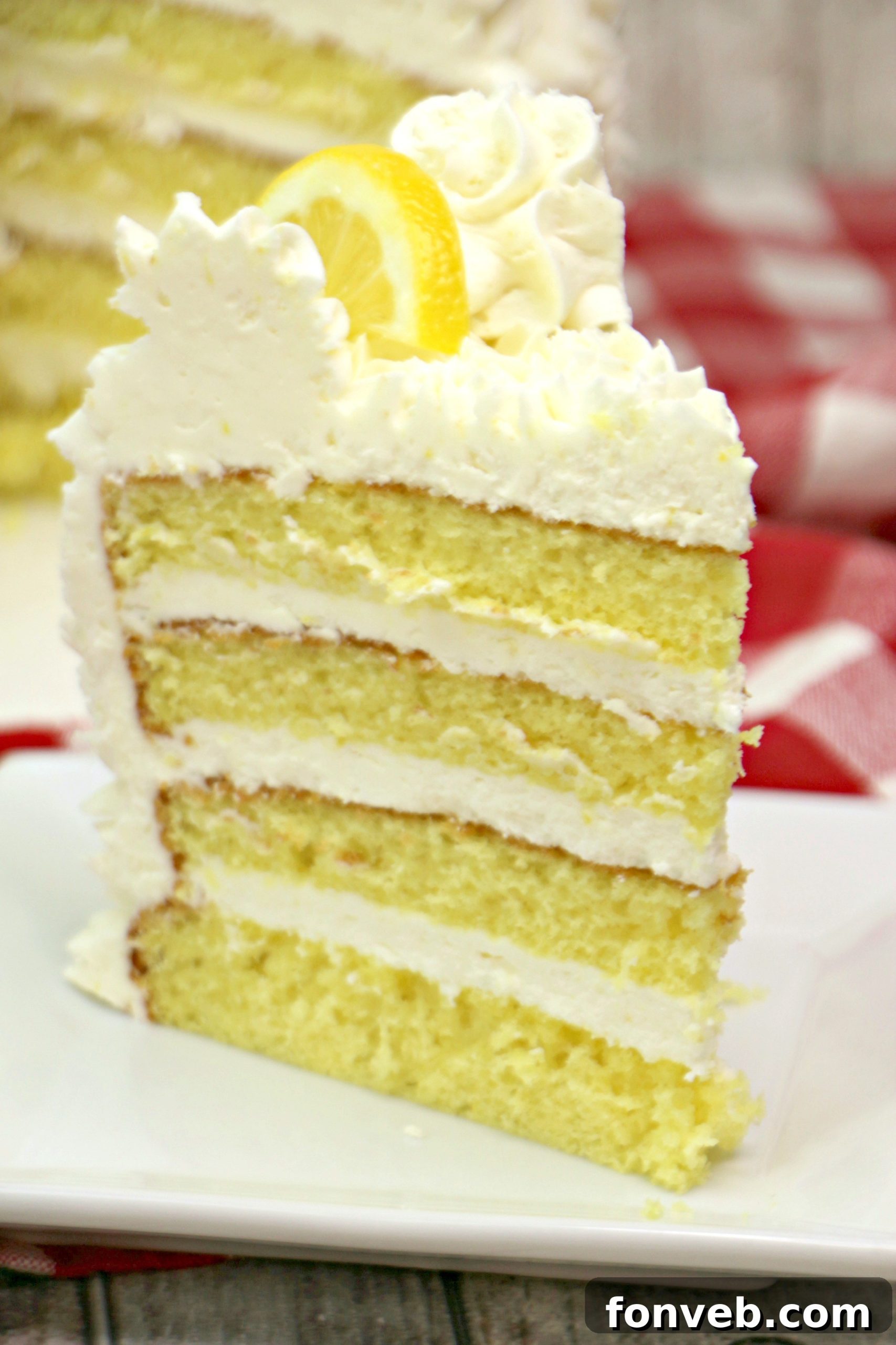 Italian Lemon Drop Cake, a vibrant and refreshing dessert topped with a rich lemon buttercream frosting.