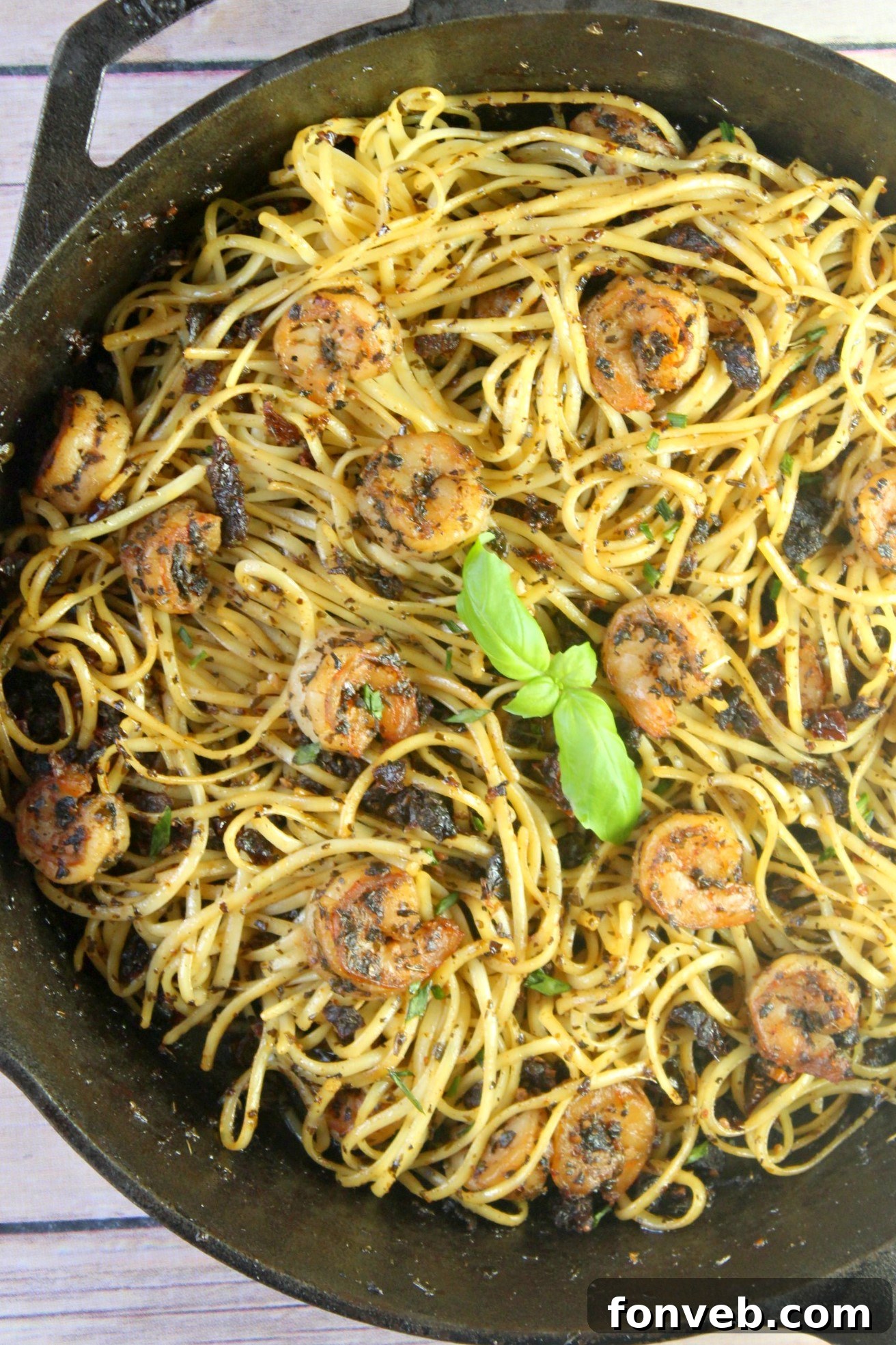 Close-up of shrimp and sun-dried tomatoes in pasta