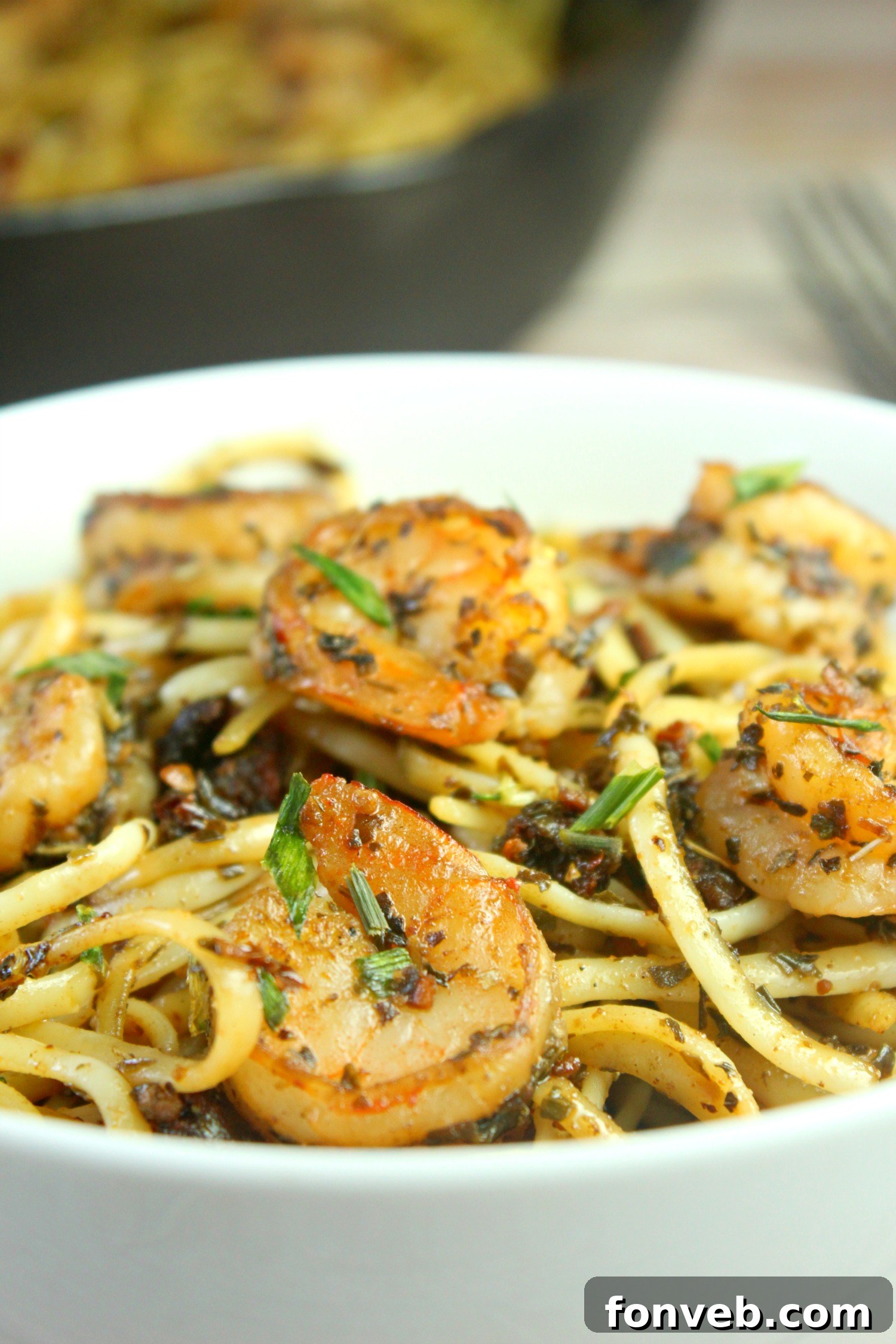 Sun-Dried Tomato Garlic Shrimp Pasta served with garlic bread