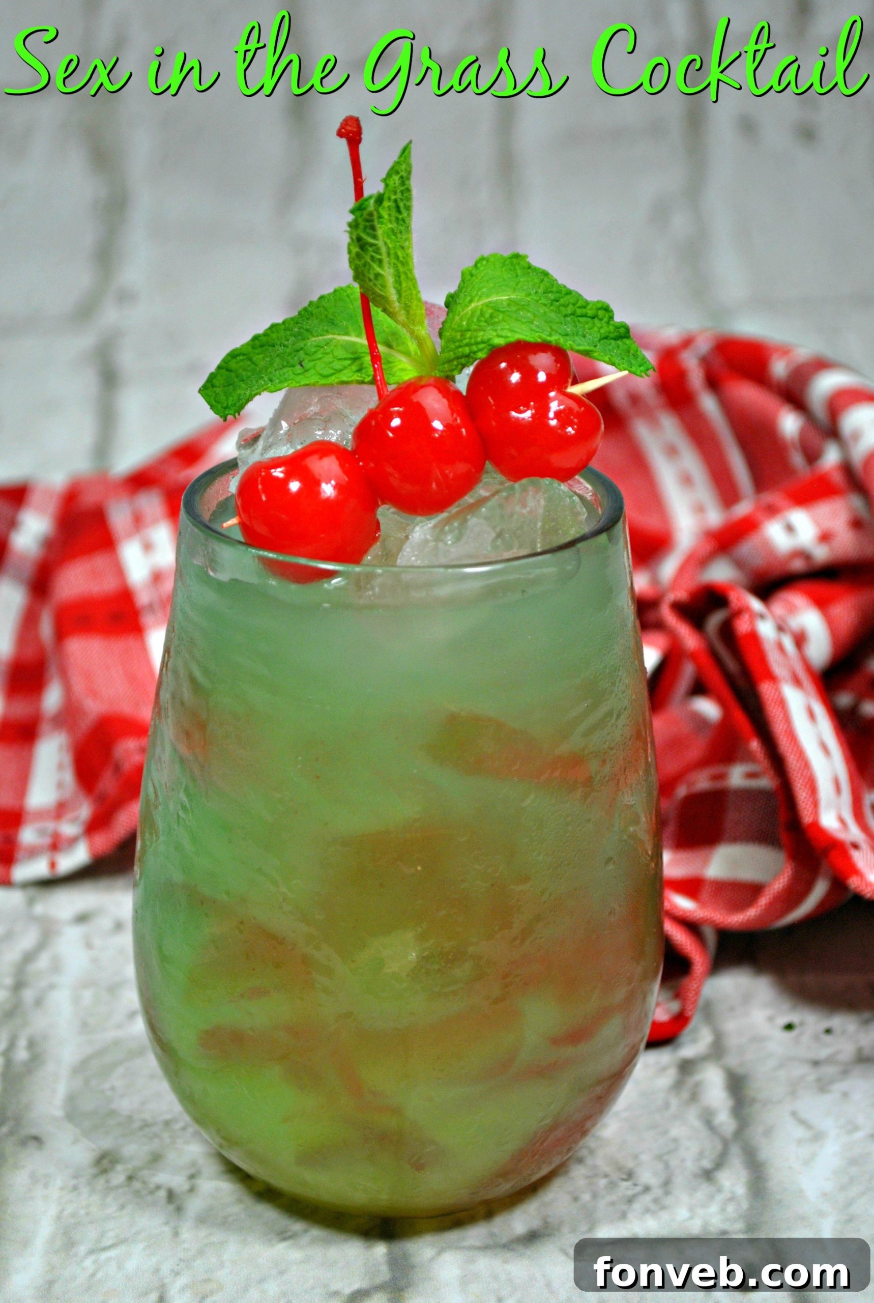 Close-up of the Sex on the Grass Cocktail, showcasing its layered colors and frosty glass.