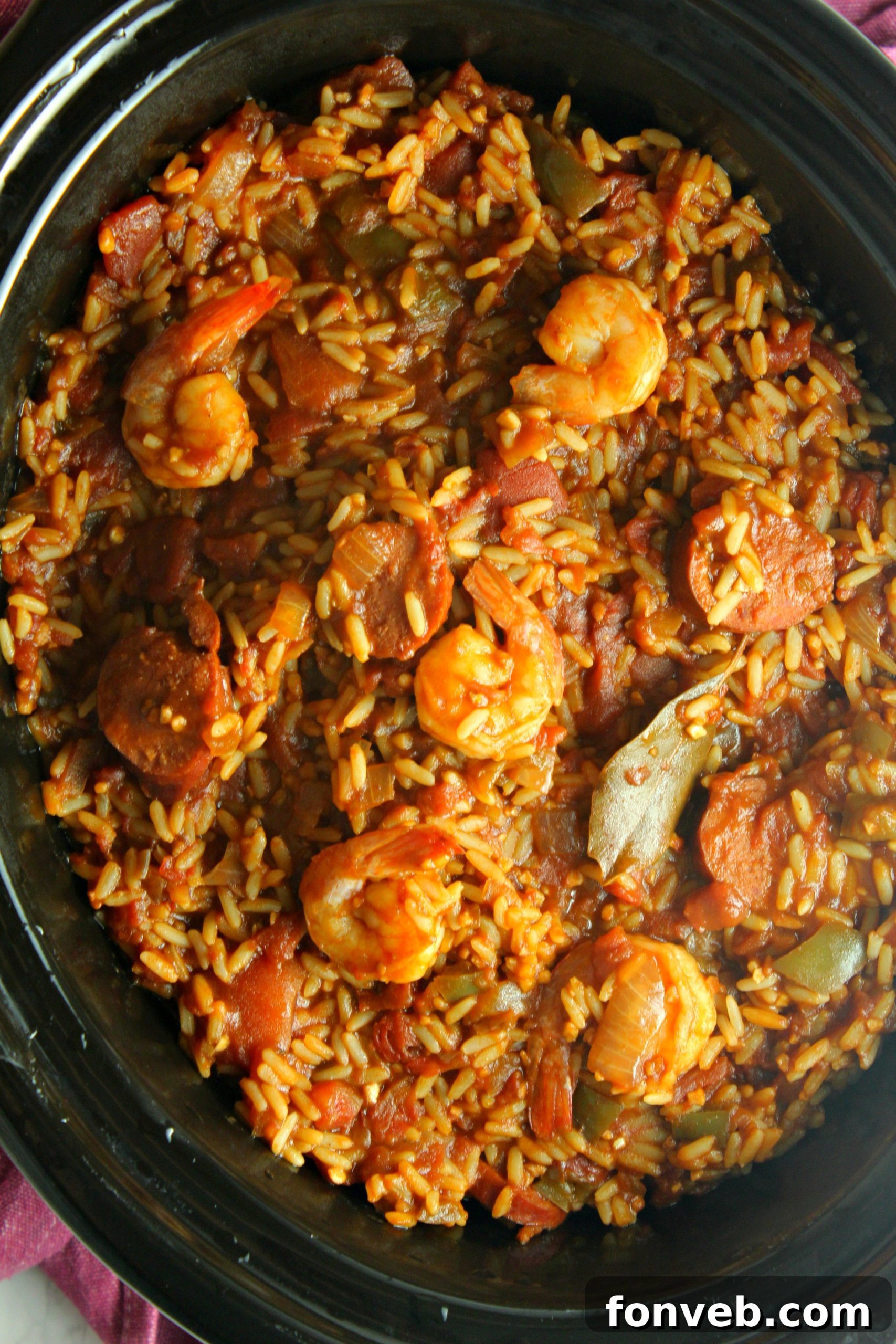 Close-up of Slow Cooker Jambalaya with a spoon, highlighting the rich texture and ingredients