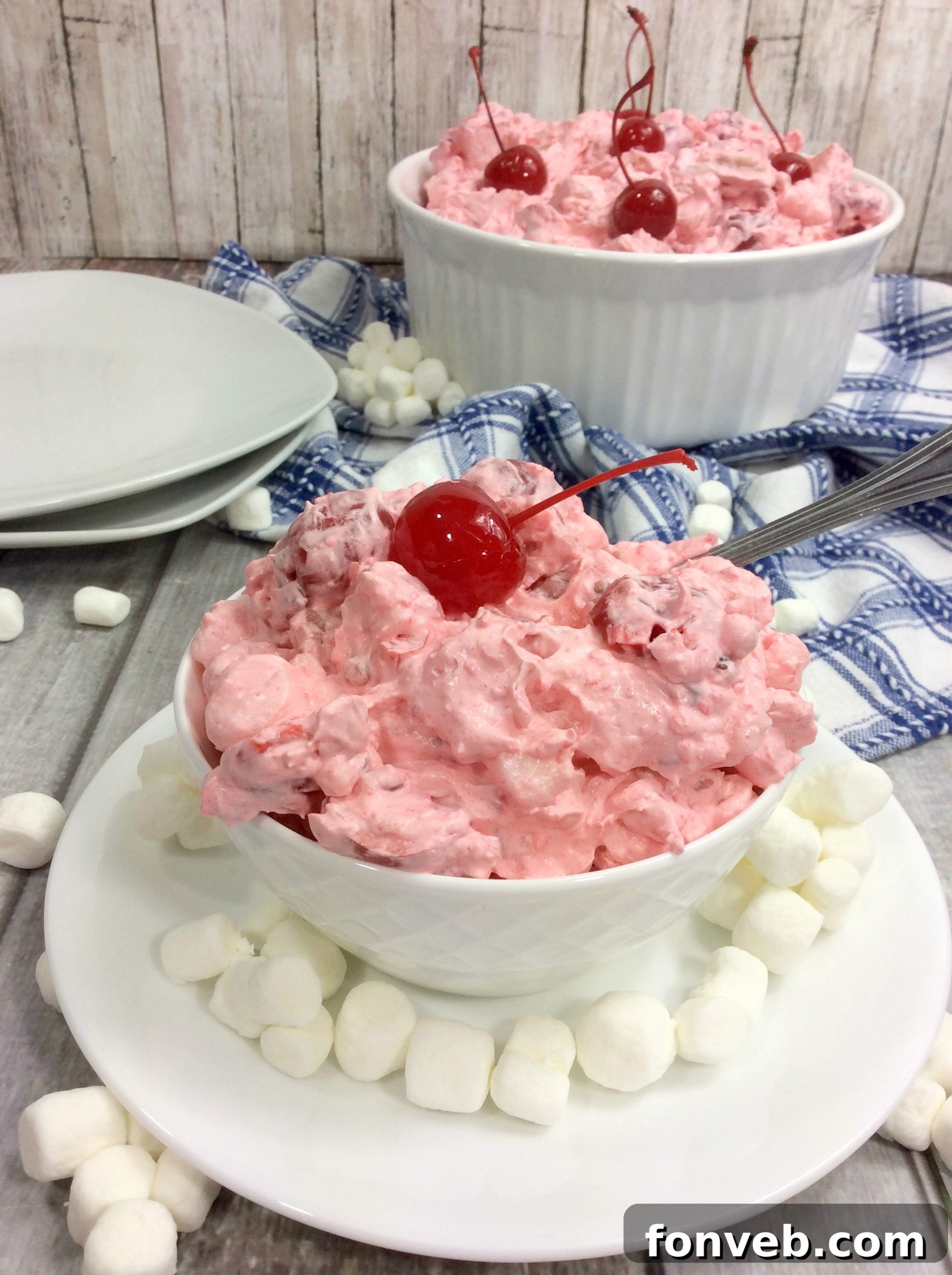 Cloud Nine Cherry Delight 8 A large serving of Cherry Fluff Salad in a decorative bowl, ready for a gathering.