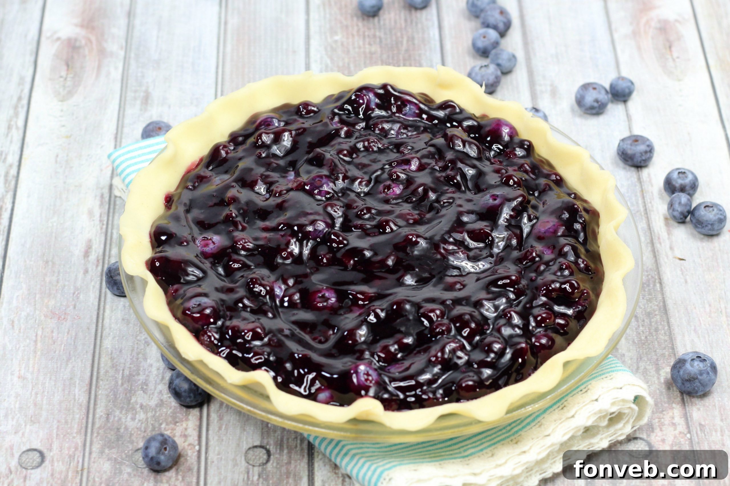 Bursting Blueberry Bliss 6 Close-up of golden, flaky pie crust