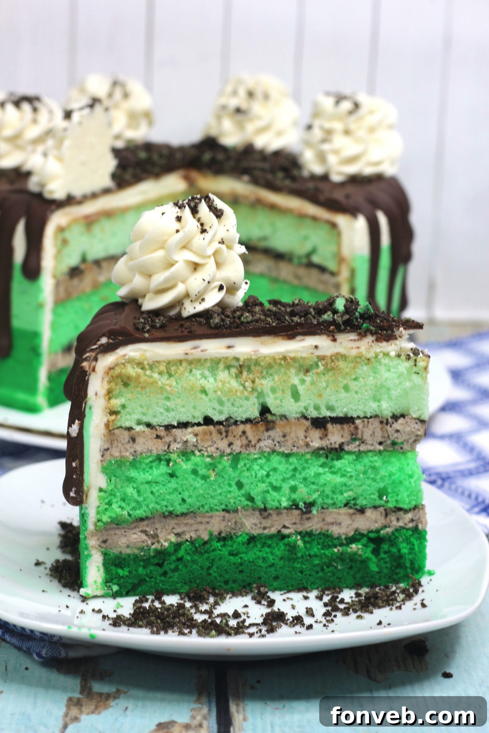 Cool Mint Oreo Decadence 4 Full view of the elegantly frosted Mint Oreo Layered Cake on a white cake stand.