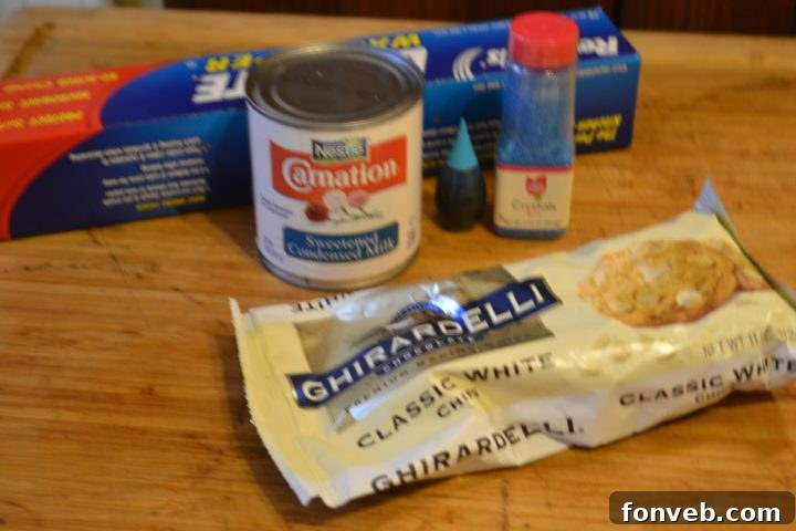 Kids enjoying making Frozen White Chocolate Bark, a fun and easy dessert activity.