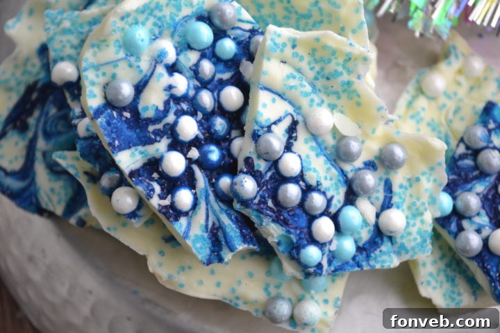 Finished Frozen white chocolate bark with blue sprinkles, ready to be chilled.