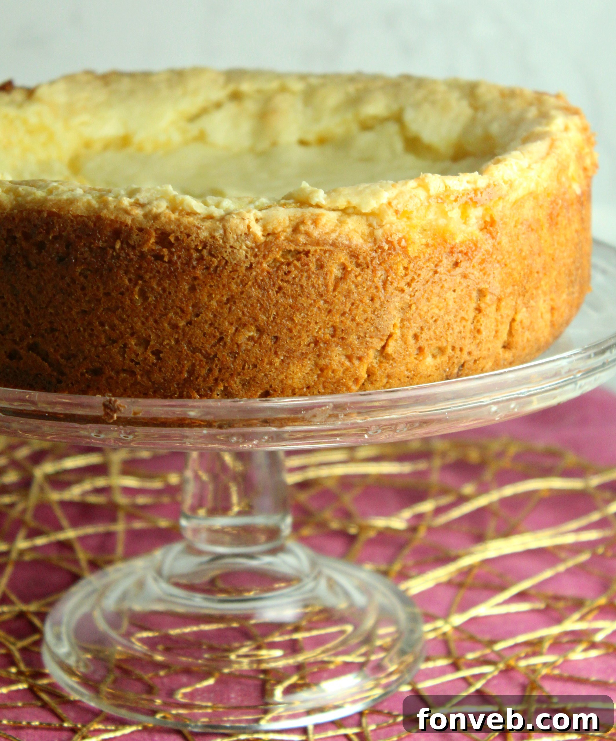 Overhead shot of a full Ooey Gooey Butter Cake, freshly baked and ready to be served.