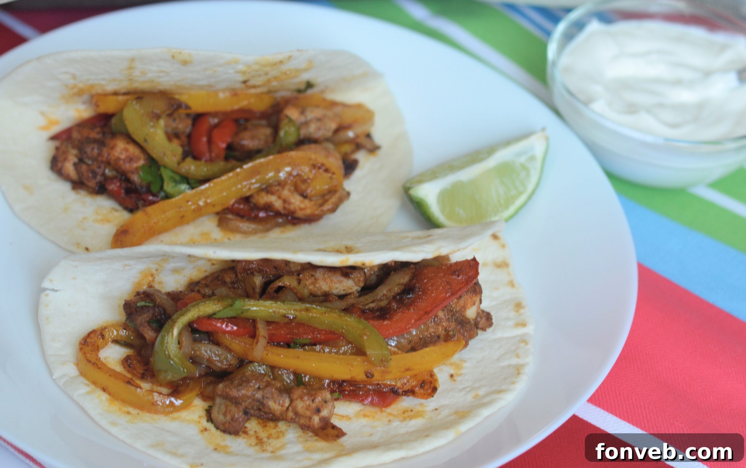 A final close-up of the cooked Sheet Pan Chicken Fajitas, glistening and ready to eat.