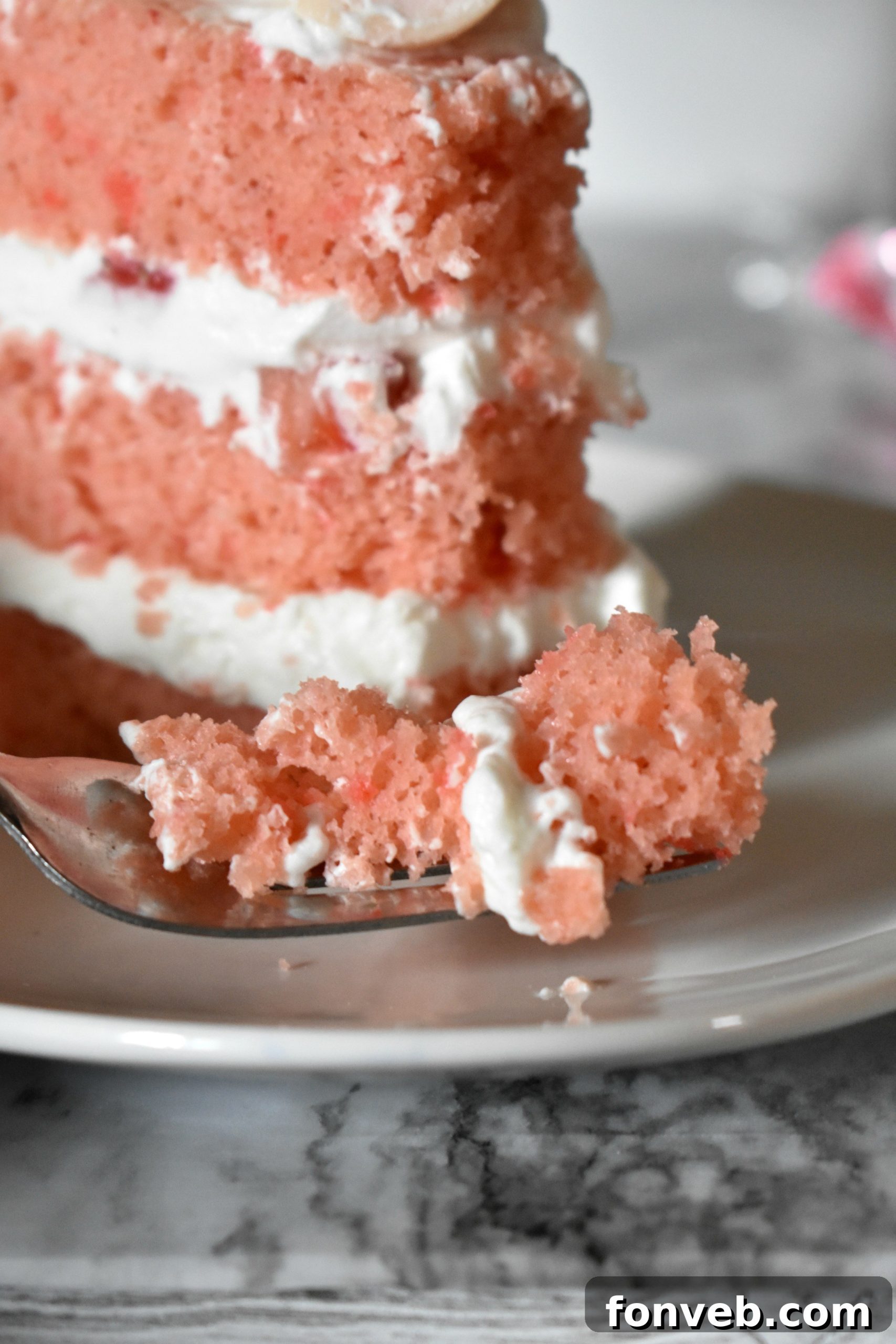 Strawberry Creamsicle Dream Cake 6 Ingredients for a doctored-up box mix strawberry cake, promising ease and deliciousness