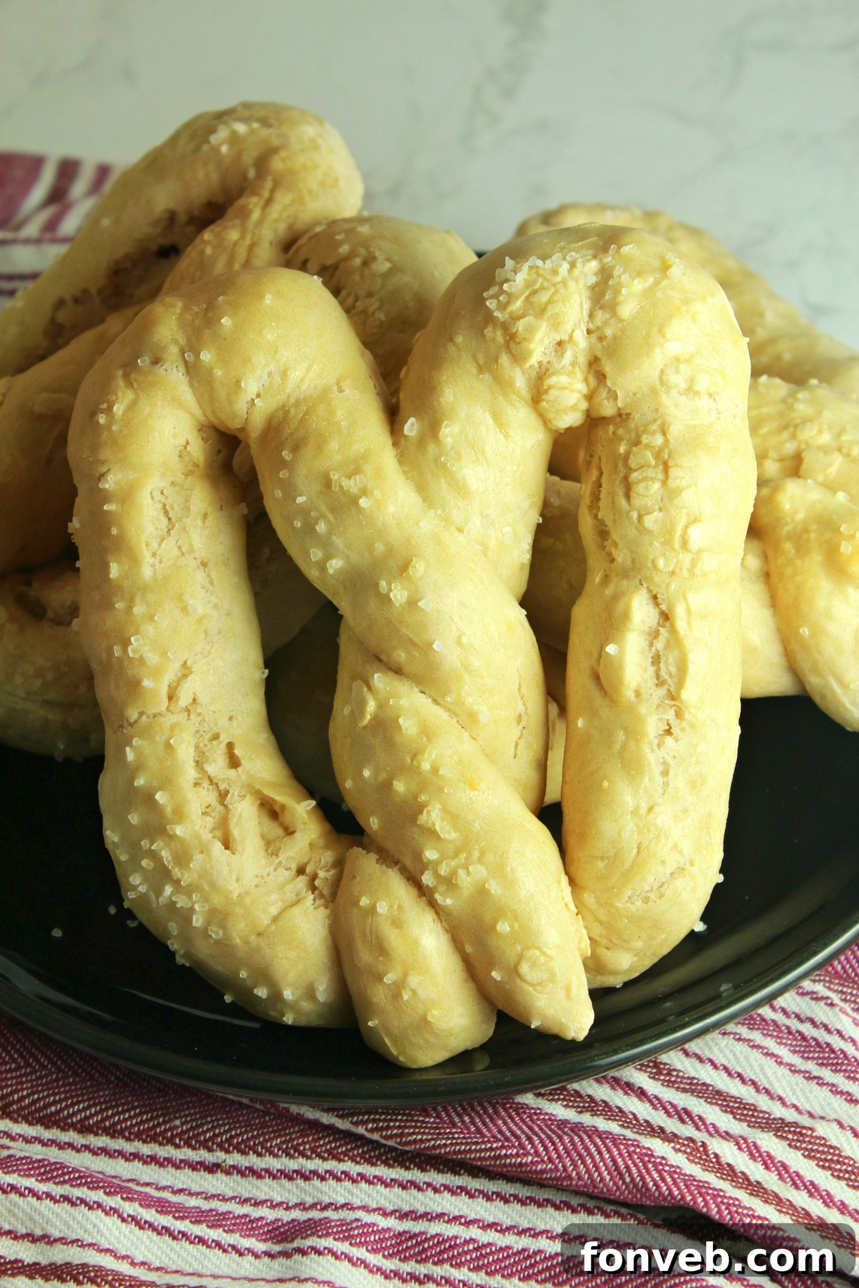 Warm Buttery Homemade Soft Pretzels 8 Soft pretzels arranged artfully with various dipping sauces