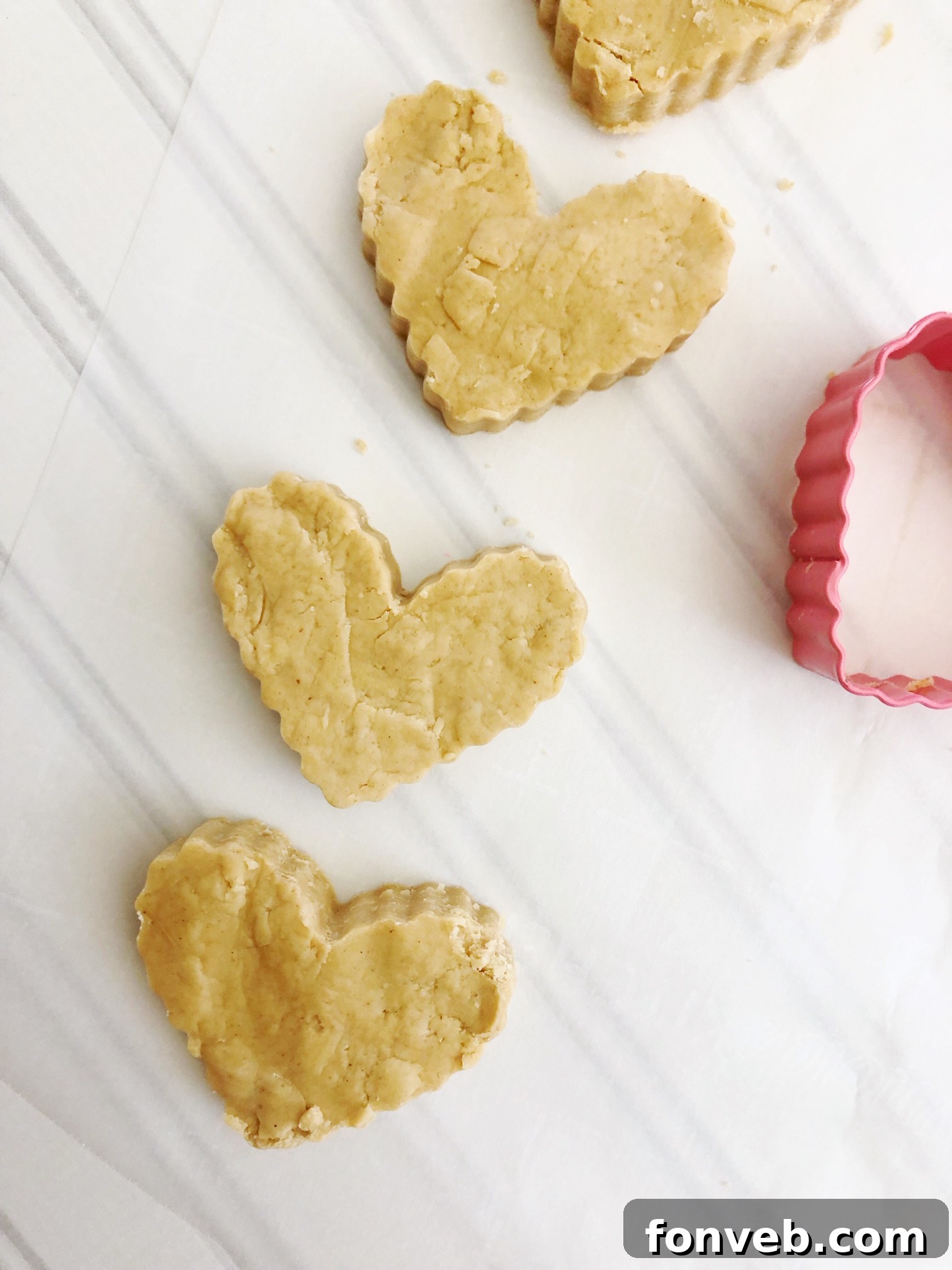 A stack of beautifully coated Reese's Peanut Butter Hearts ready to be enjoyed