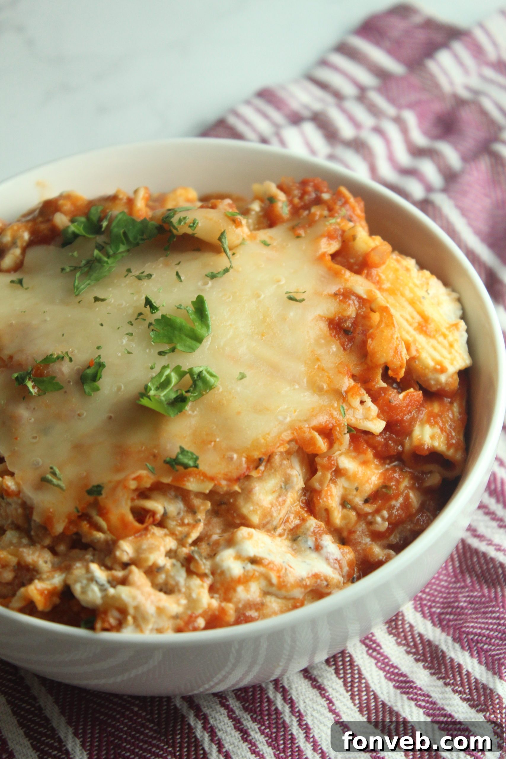 Slow cooker cheesy baked ziti ready for serving