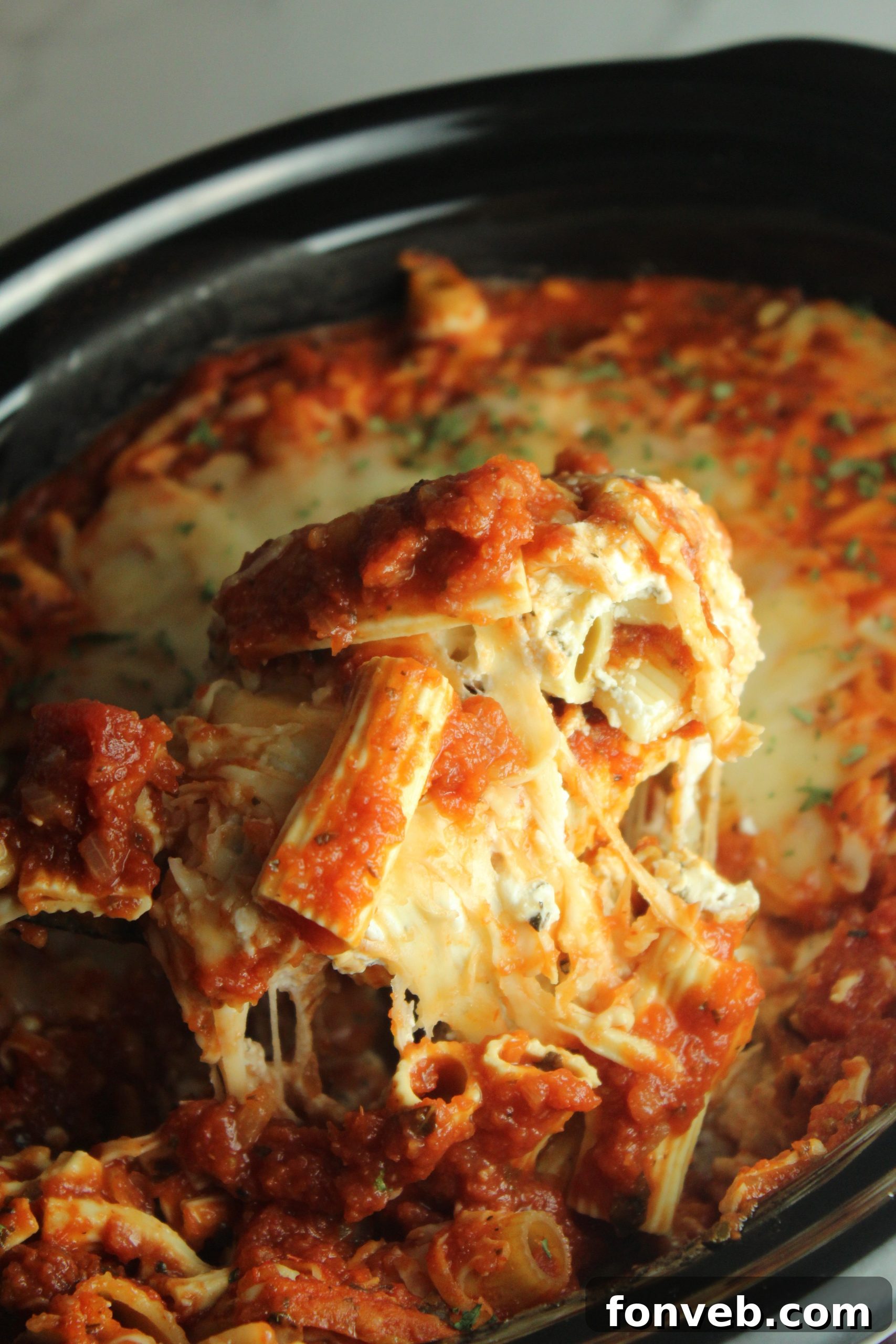 Preparing ingredients for slow cooker baked ziti