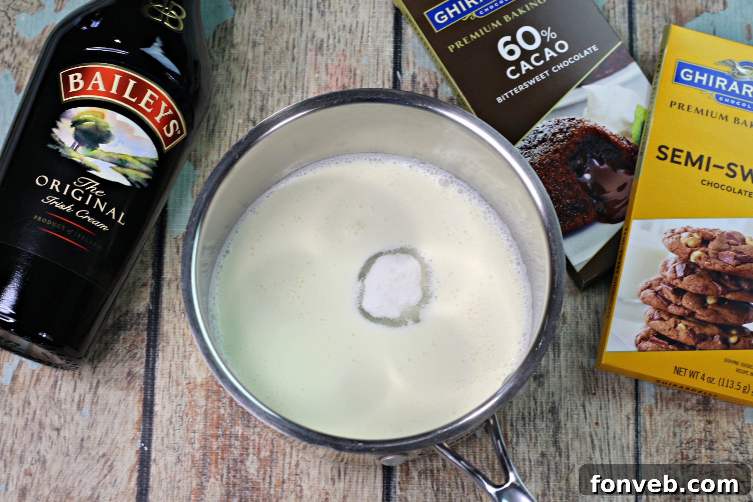 A stunning arrangement of several finished Bailey's Irish Cream truffles on a white plate, ready for serving.