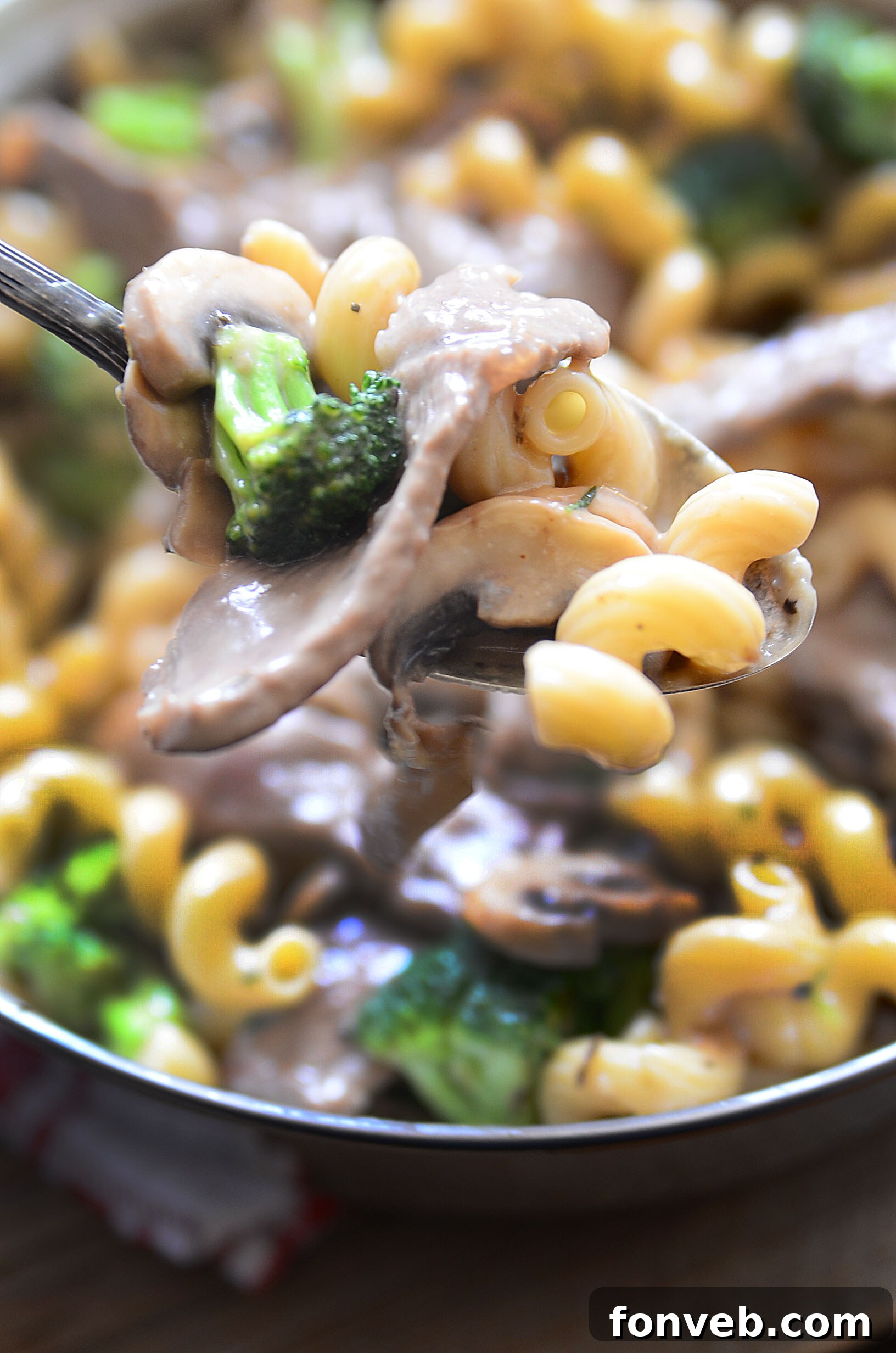 Hearty Beef, Mushroom & Broccoli Pasta 4 A bowl of Beef, Mushroom, and Broccoli Pasta served, with steam rising, indicating its freshness.