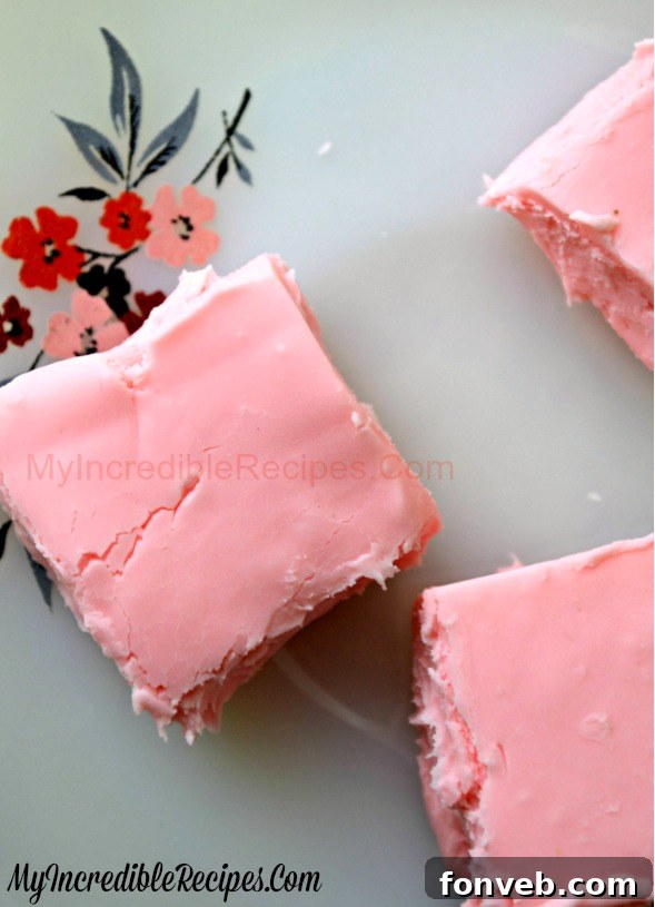 Cream cheese fudge decorated with festive sprinkles and cut into shapes
