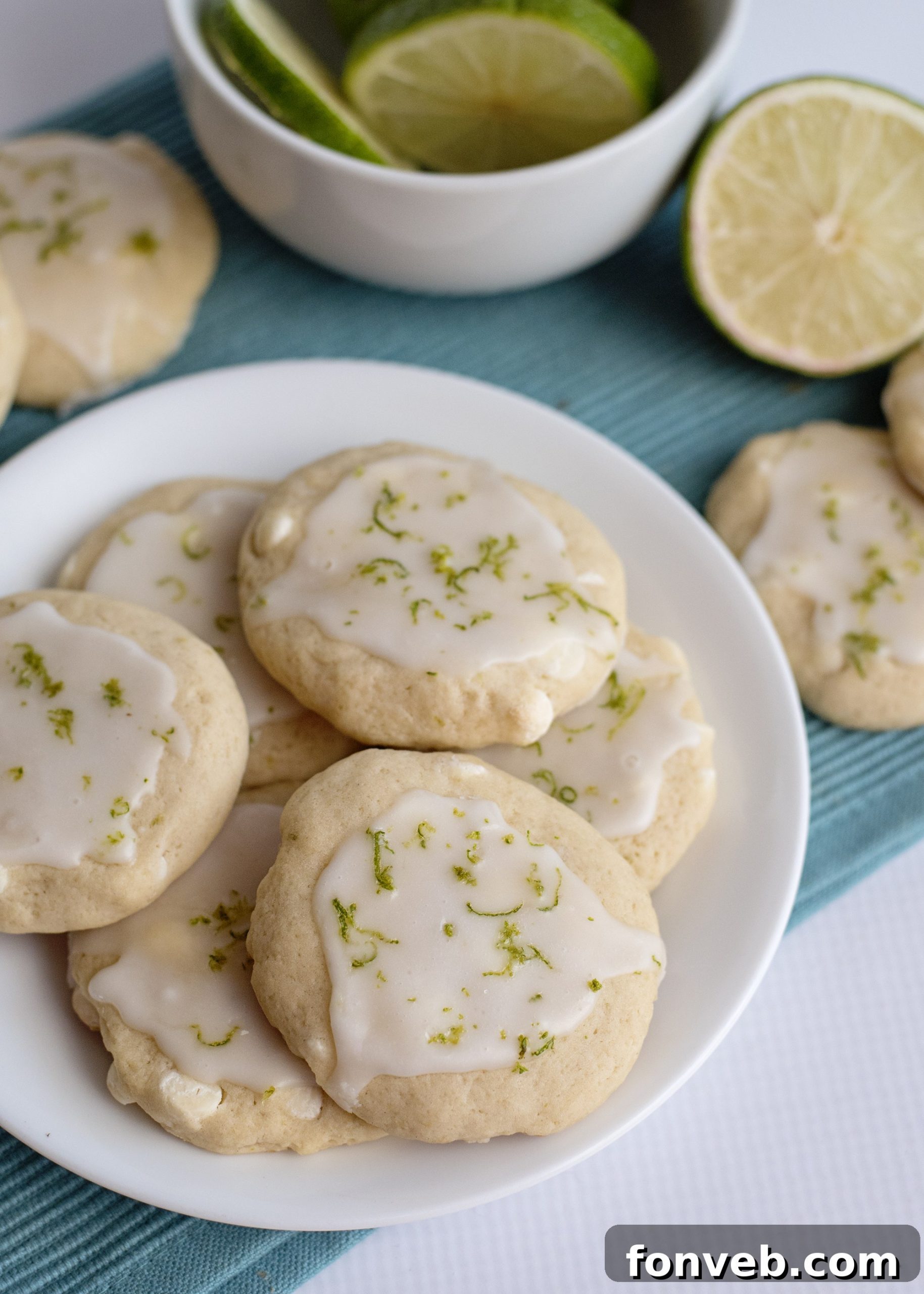 A stack of Key Lime Pie Cookies with a glass of milk, showcasing their inviting texture