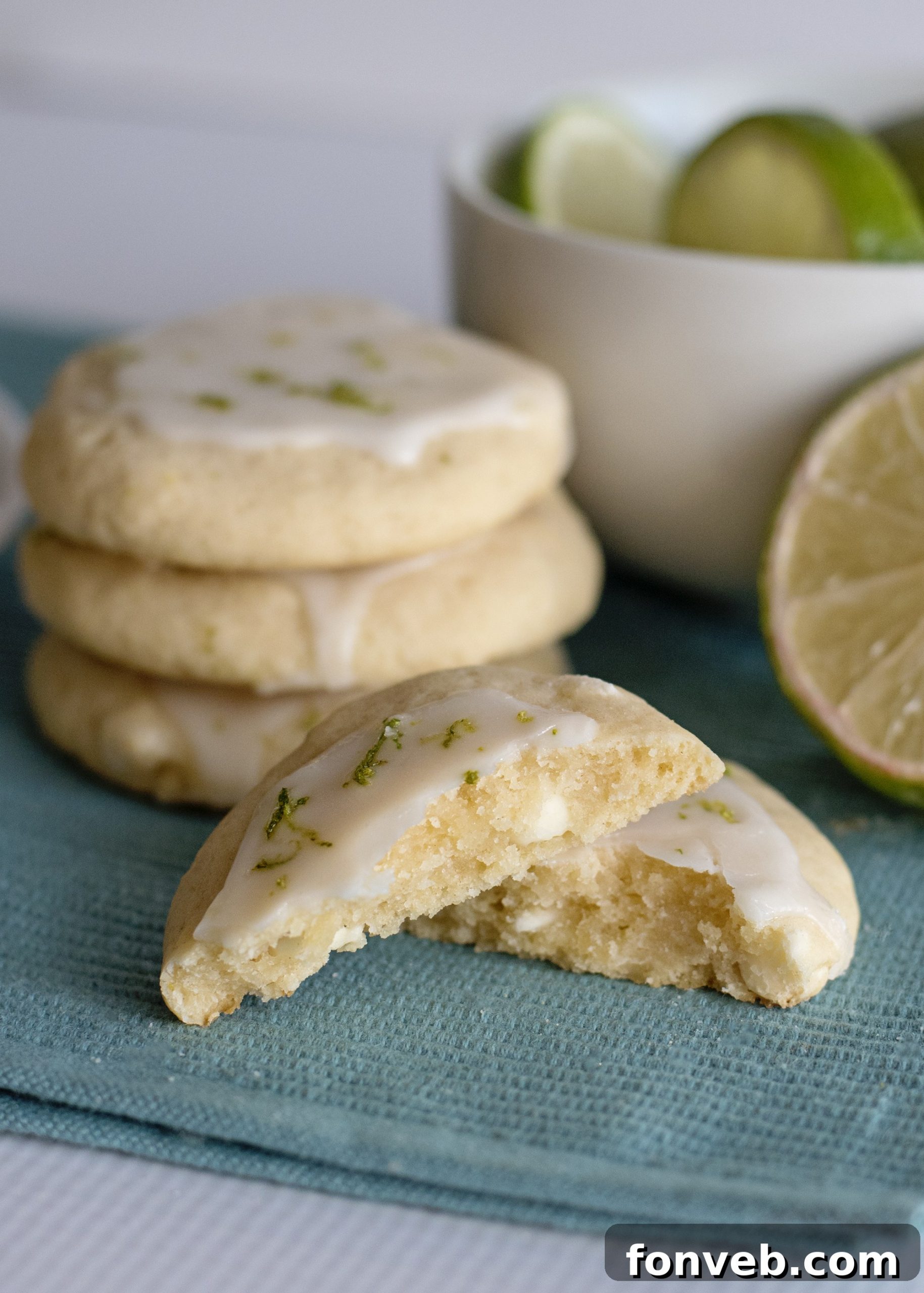 Fresh lemons and limes on a wooden board, highlighting the recipe's versatility