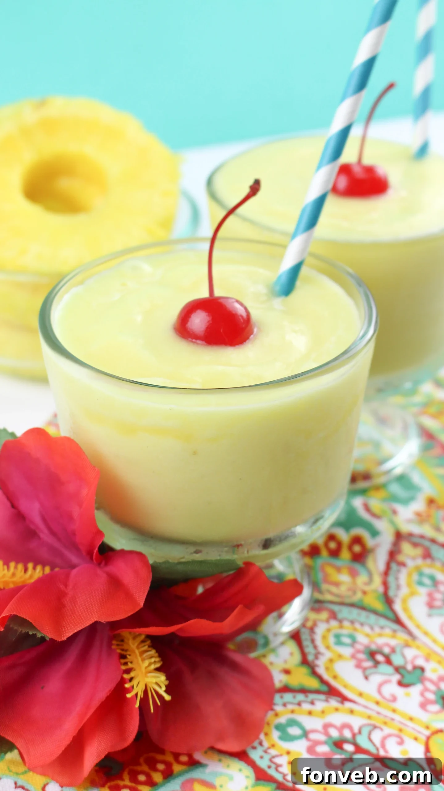 Disney's Tropical Pineapple Whip 2 Delicious Homemade Disney Dole Pineapple Whip served in a clear glass