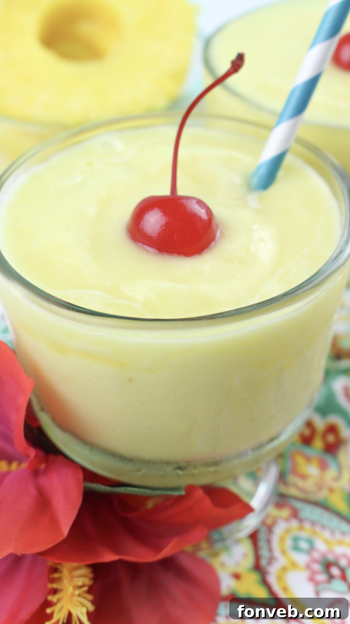 Disney's Tropical Pineapple Whip 3 Close-up of a perfectly swirled homemade Dole Whip, showcasing its creamy texture