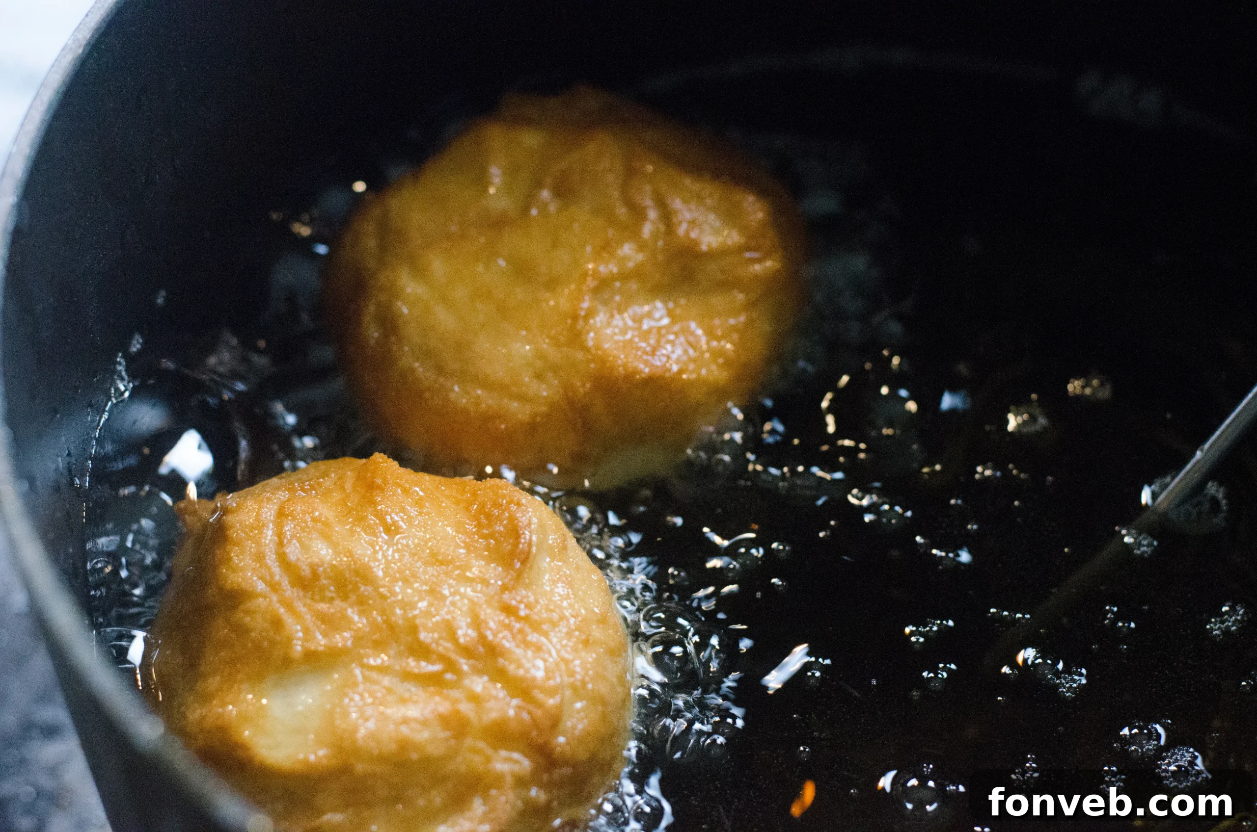 Chinese Fried Doughnuts 4 A plate full of freshly made Chinese sugar donuts, dusted with sugar, ready to be served.