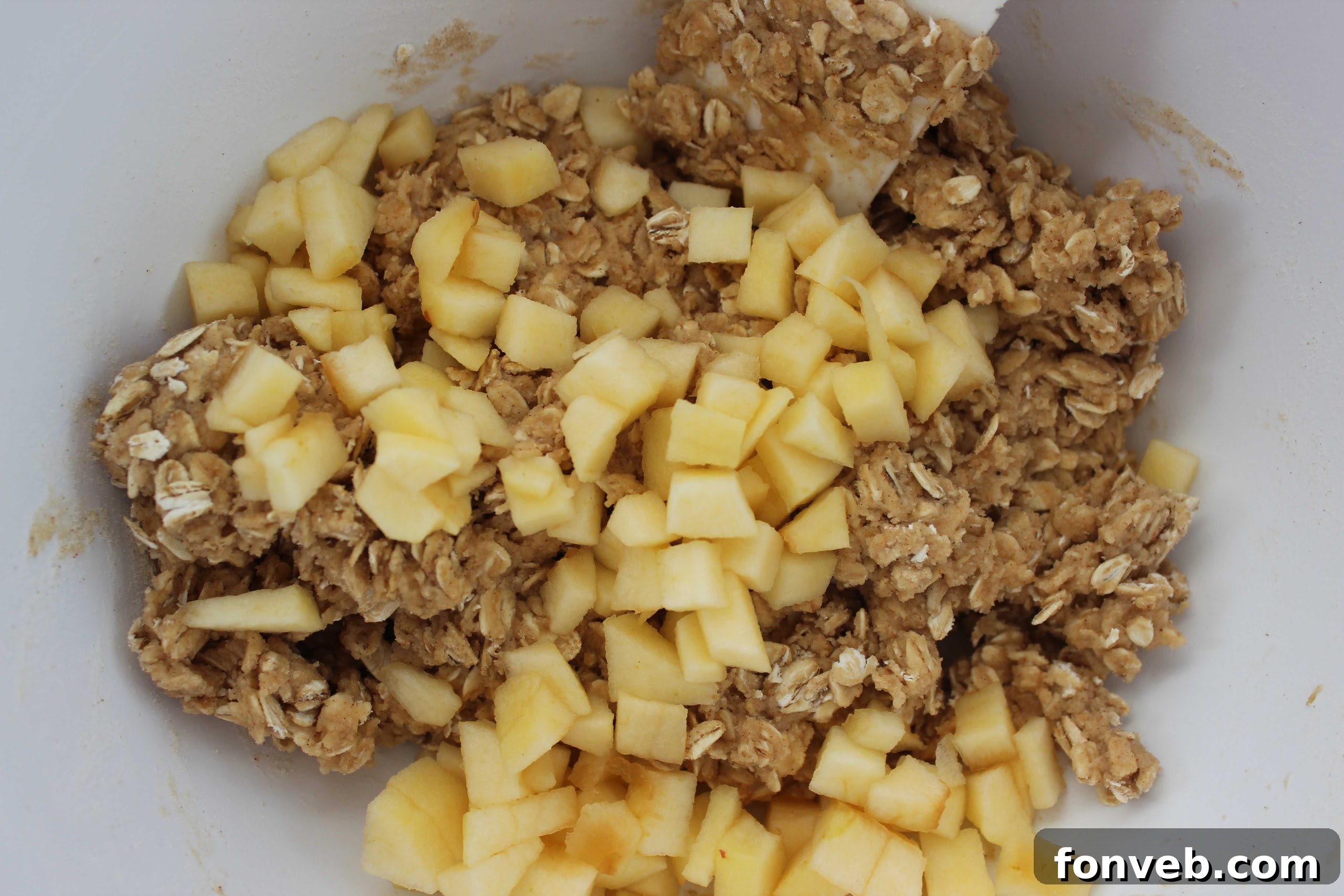 Freshly baked Apple Cinnamon Oatmeal Cookies arranged on a plate, ready to be enjoyed