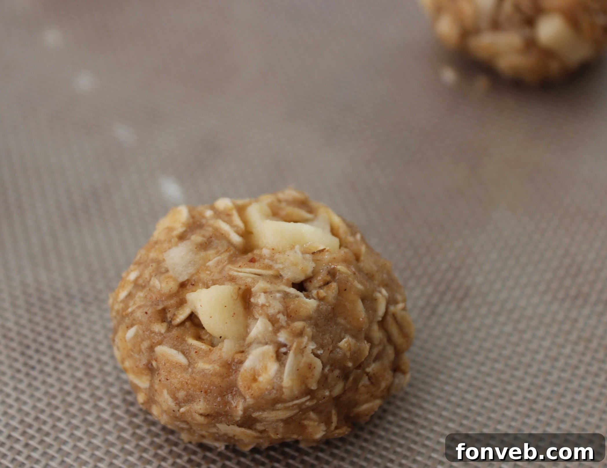 Close-up of diced apples, the fresh ingredient for the cookies