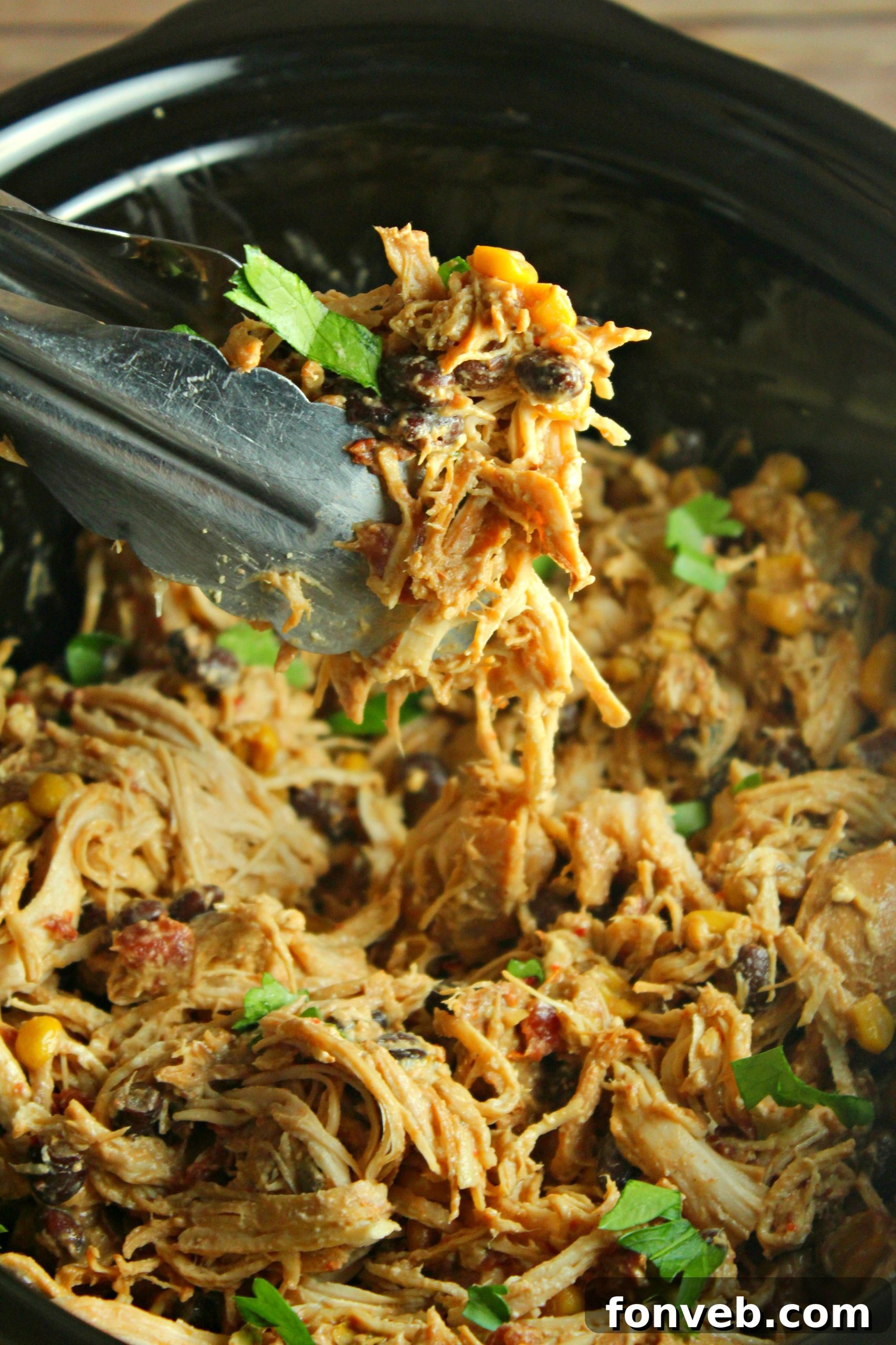 Set-It-and-Forget-It Fiesta Chicken 5 A close-up of the Slow Cooker Fiesta Chicken mixture