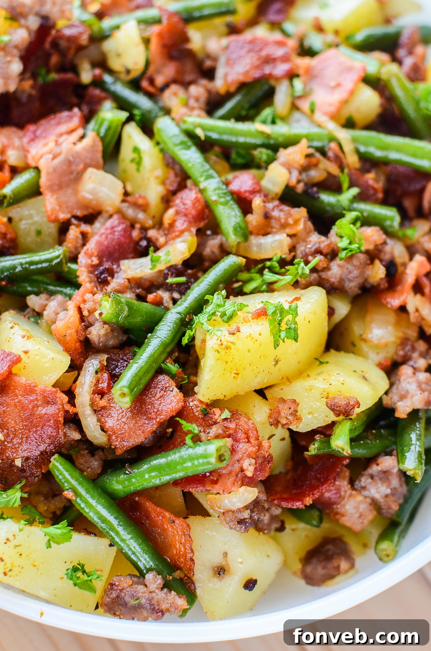 A large pot filled with the Southern Sausage, Potatoes, and Green Beans, simmering to perfection.