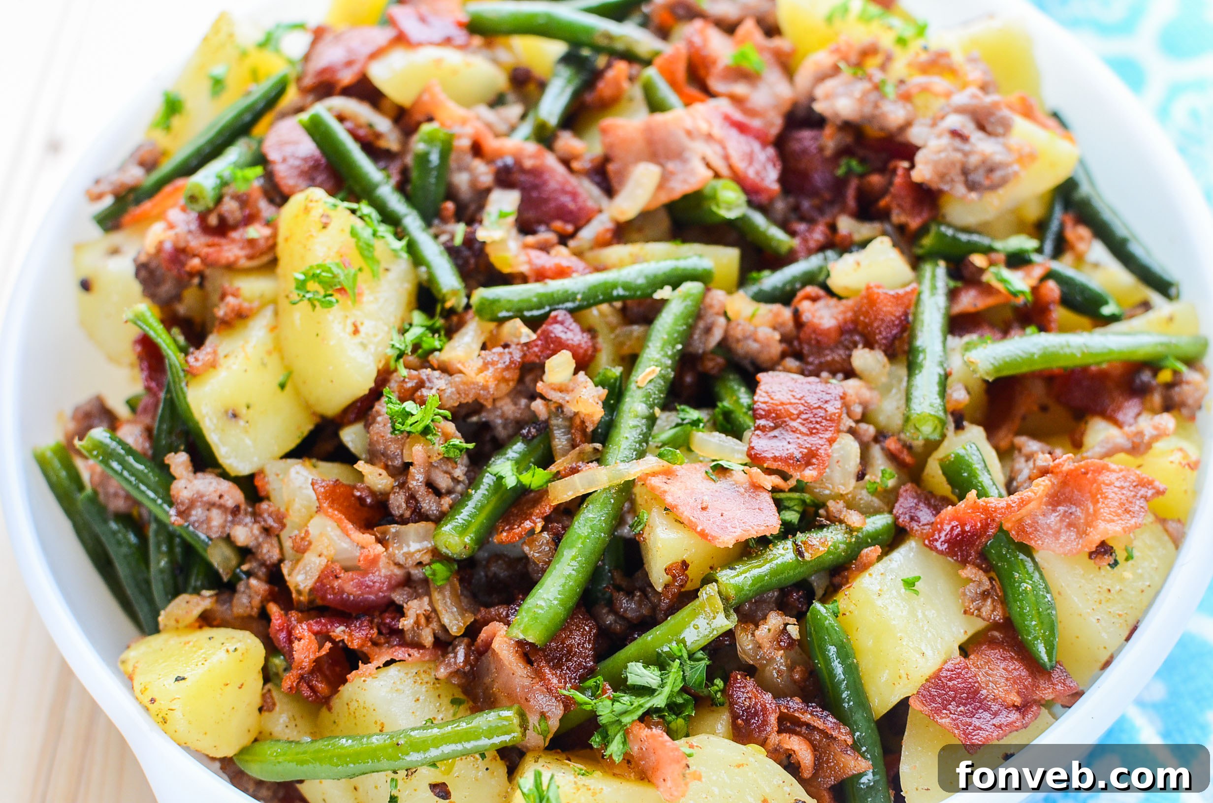 The Southern Sausage, Potatoes, and Green Beans dish, captured from a different angle in the pot.