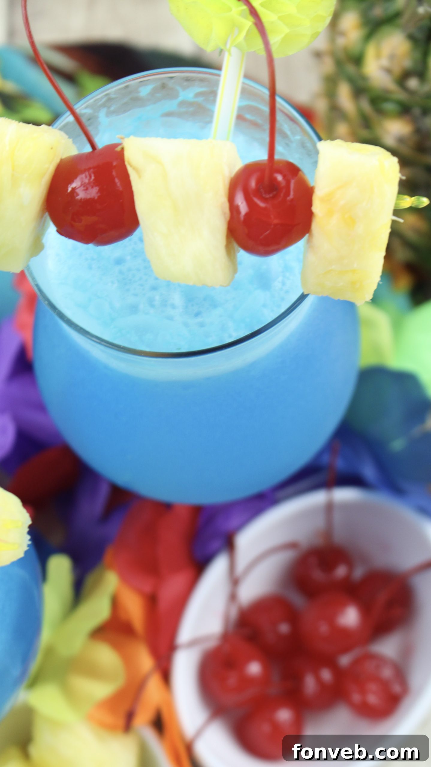 Blue Hawaiian Tropical Escape 6 Hands holding a blender filled with Blue Hawaiian cocktail ingredients, ready to blend.