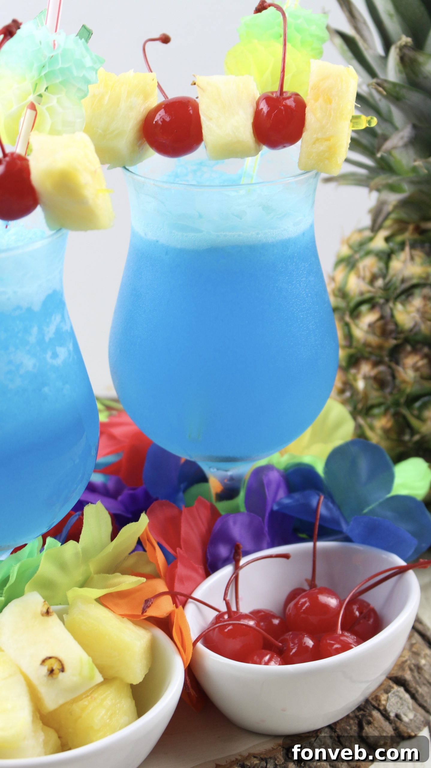 Blue Hawaiian Tropical Escape 8 A stunning Blue Hawaiian cocktail, garnished with a pineapple wedge and maraschino cherry, ready to be enjoyed.