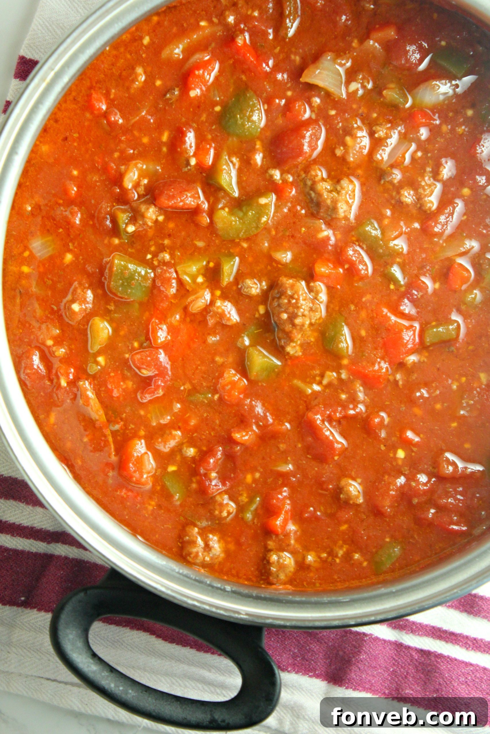 Rustic Stuffed Bell Pepper Soup 4 A bowl of stuffed pepper soup from an aerial view, showing the vibrant colors and hearty ingredients, ready to be served.