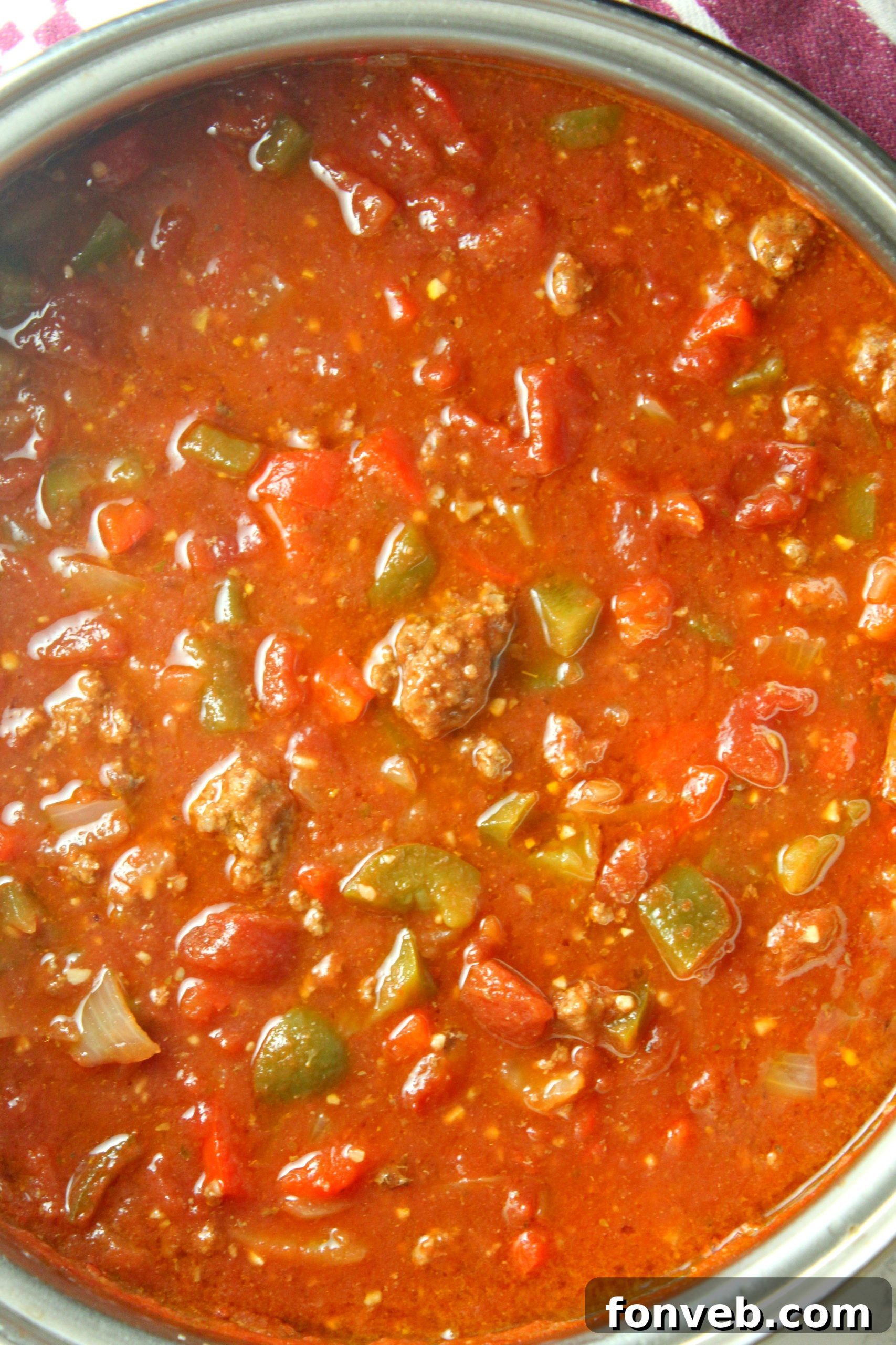 Rustic Stuffed Bell Pepper Soup 5 A large pot filled with the bubbling, rich stuffed pepper soup, demonstrating its generous portion size and readiness for serving.