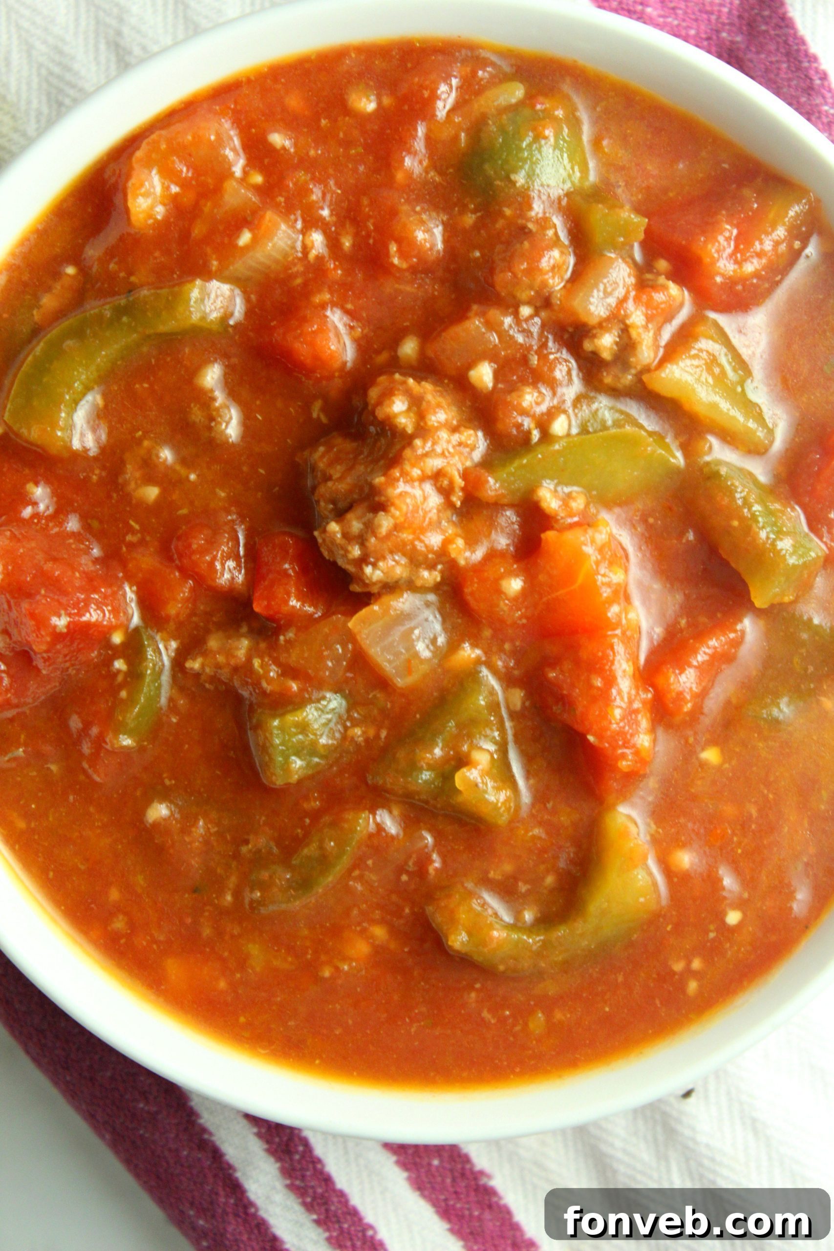 Rustic Stuffed Bell Pepper Soup 7 Six containers of prepped stuffed pepper soup, ready for freezing or refrigeration, demonstrating its meal-prep friendly nature.